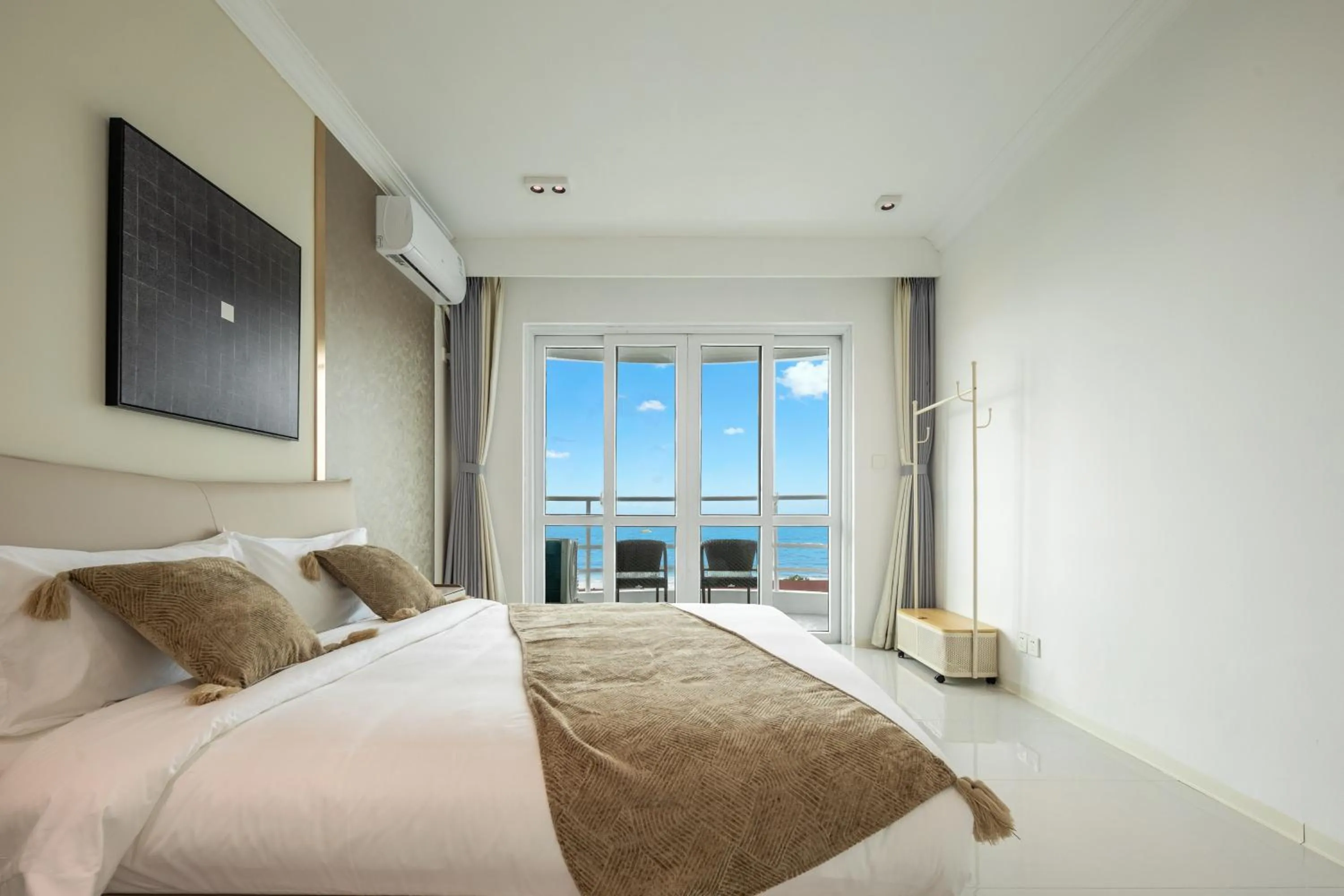 Bed in Sanya Sun Seaview Apartment