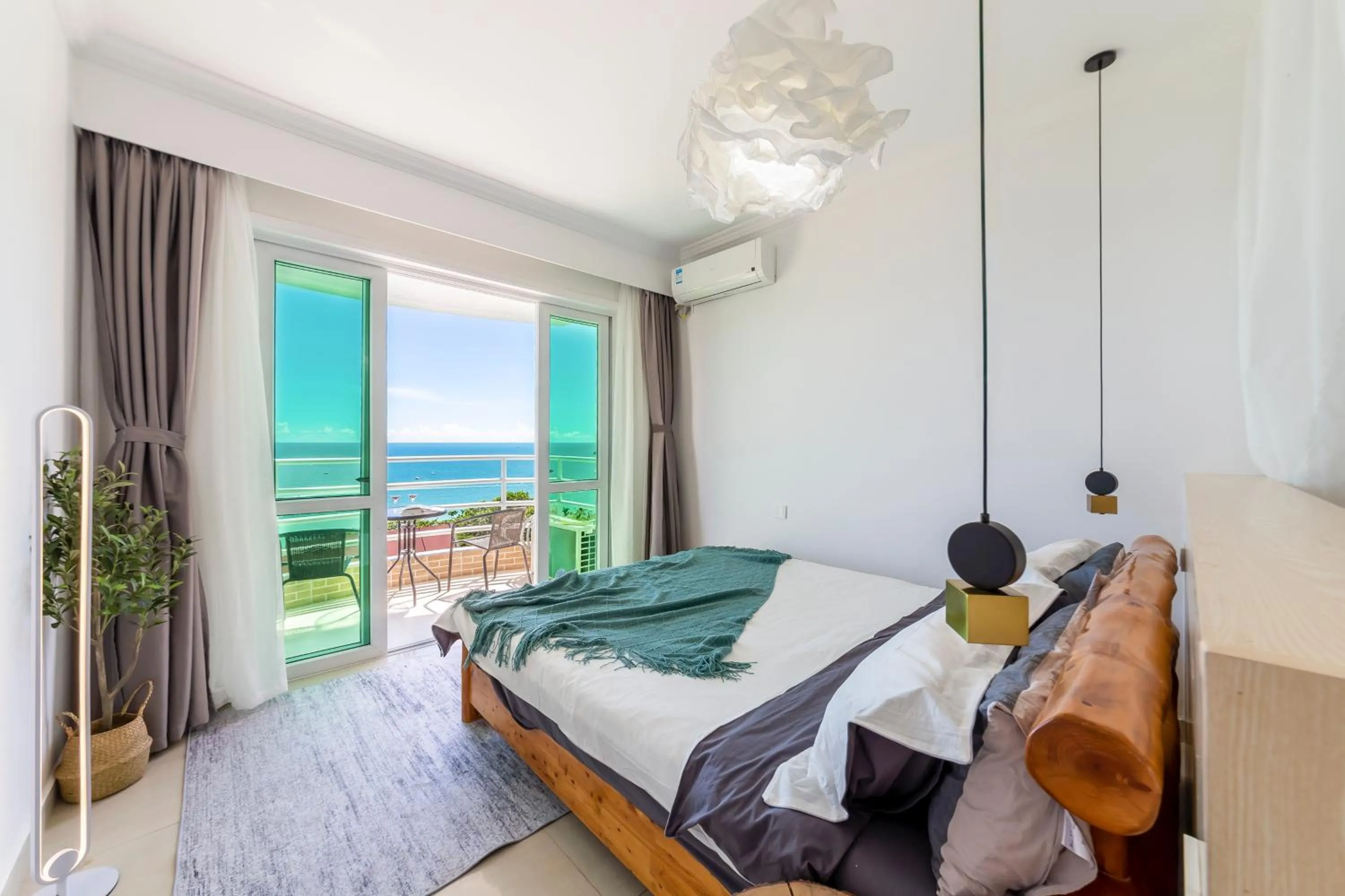 Bed in Sanya Sun Seaview Apartment
