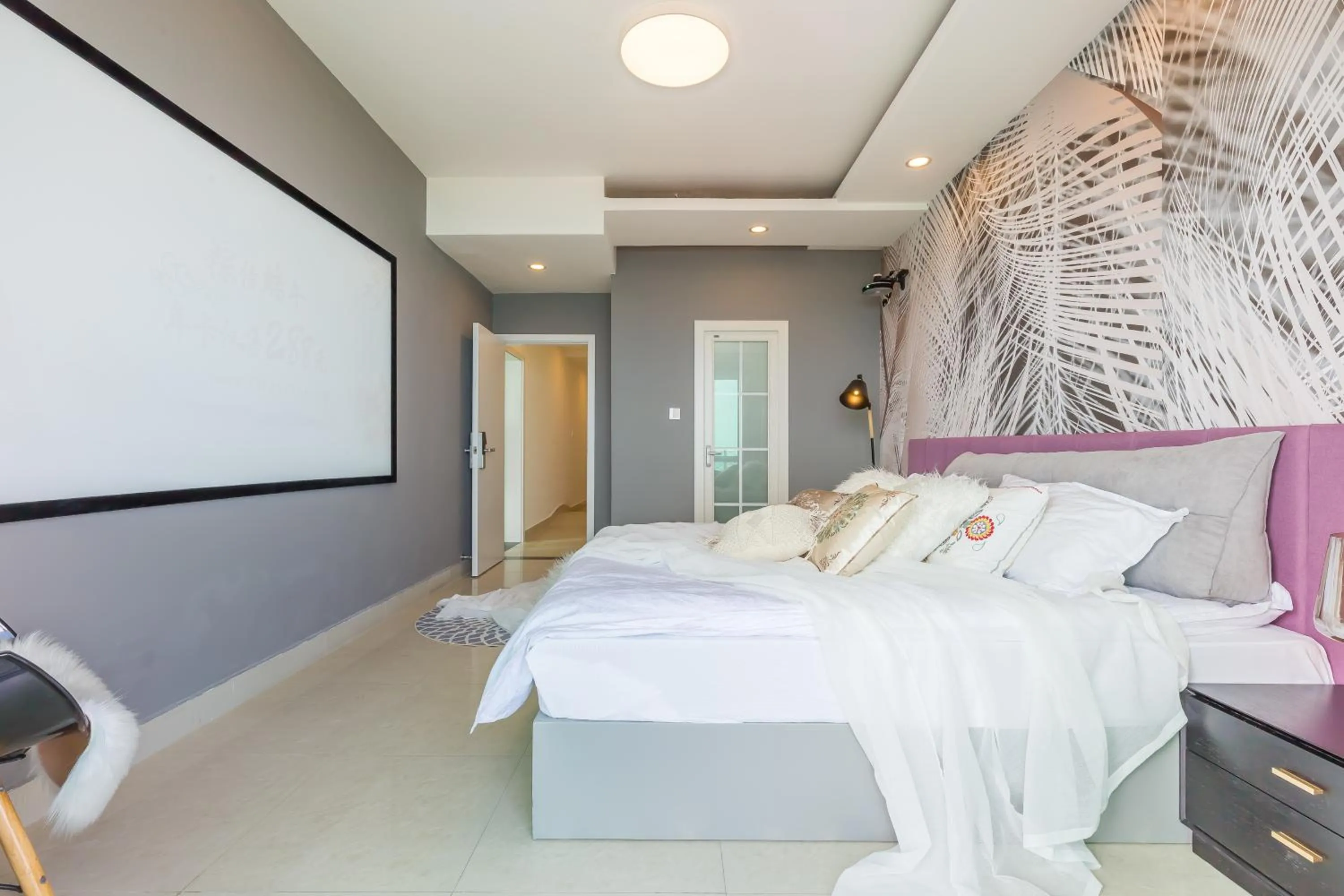 Bed in Sanya Sun Seaview Apartment