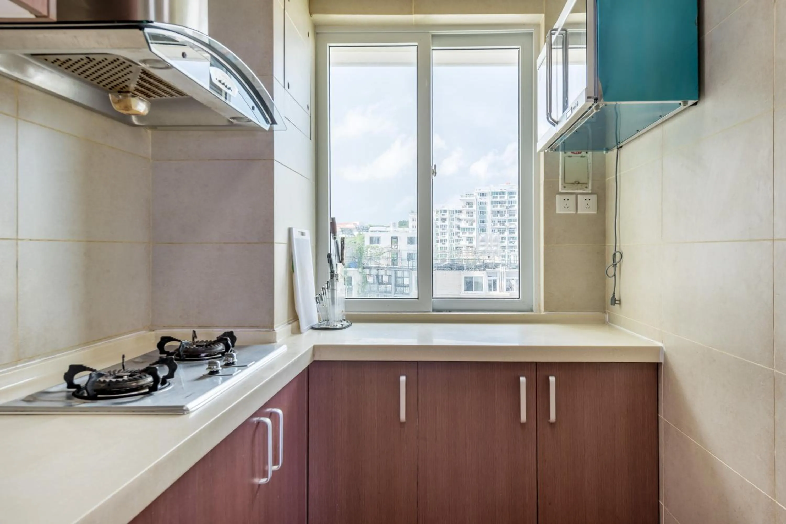 Kitchen or kitchenette in Sanya Sun Seaview Apartment