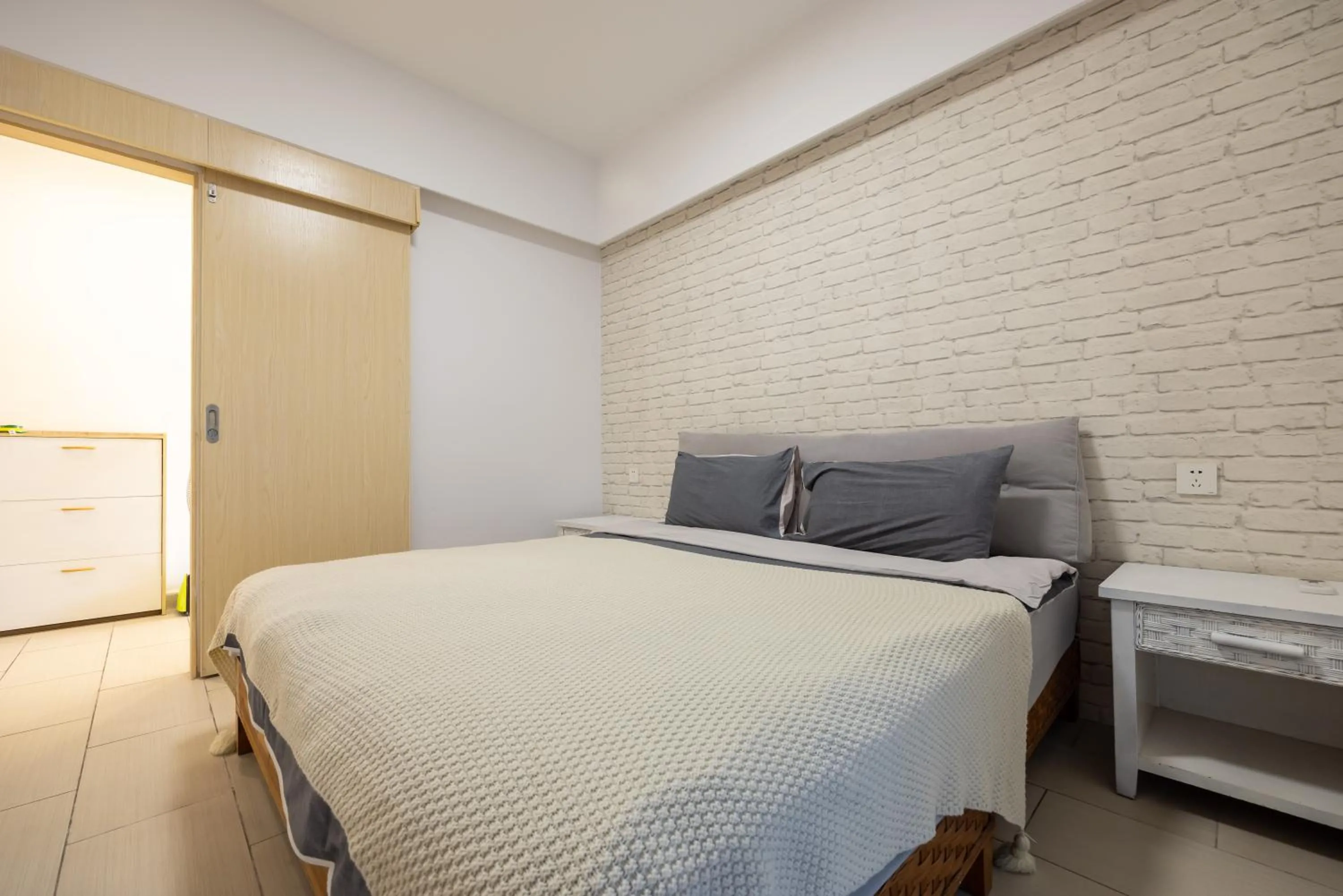 Bed in Sanya Sun Seaview Apartment
