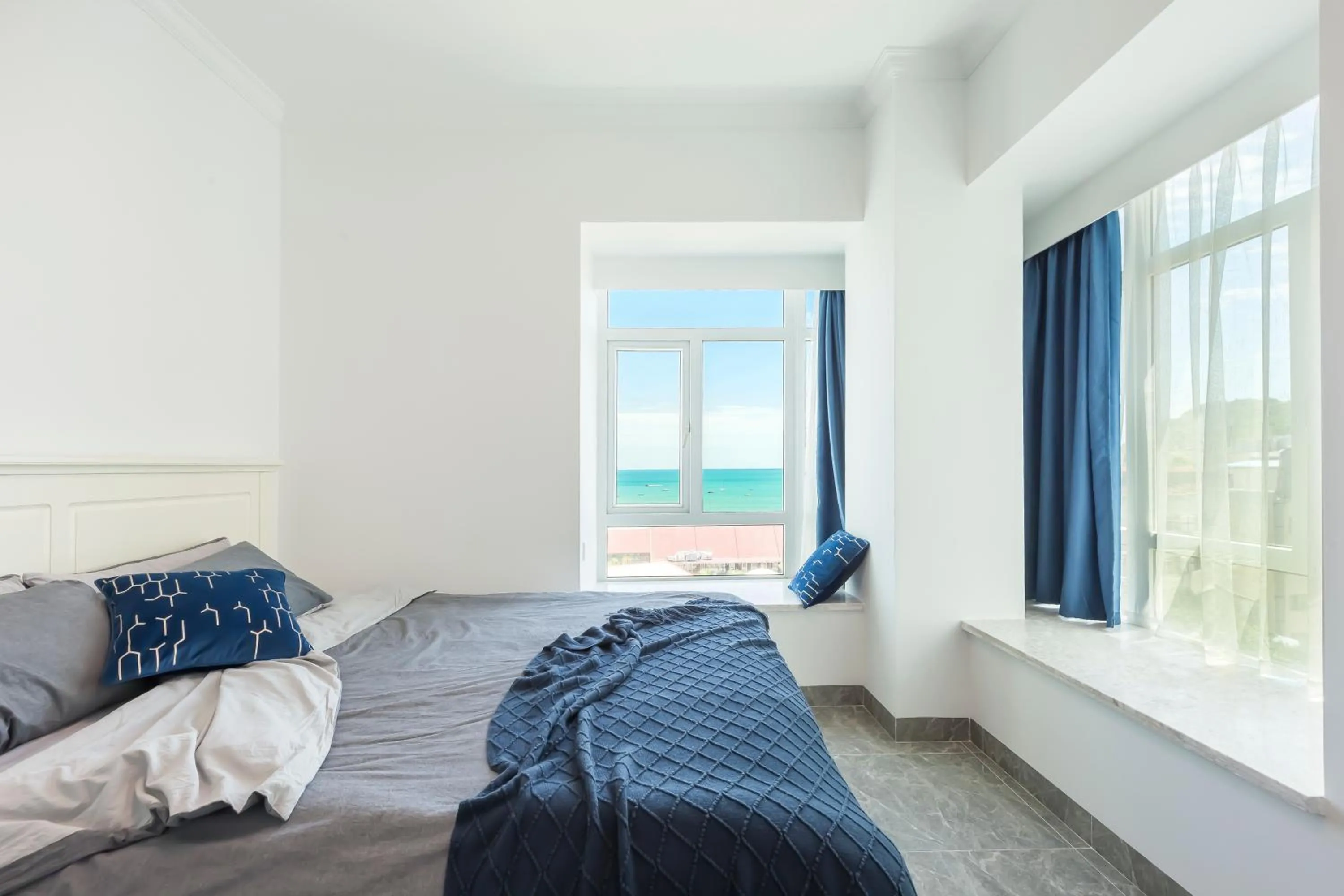 Bed in Sanya Sun Seaview Apartment