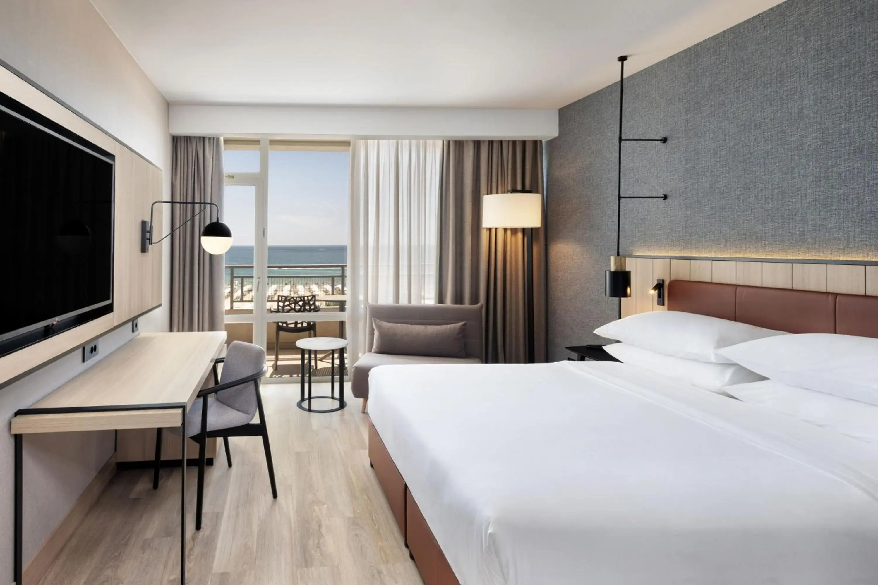 Deluxe King Room with Fold-out Chair and Sea View in Four Points by Sheraton Sunny Beach Deluxe King Room with Fold-out Chair and Sea View in Four Points by Sheraton Sunny Beach