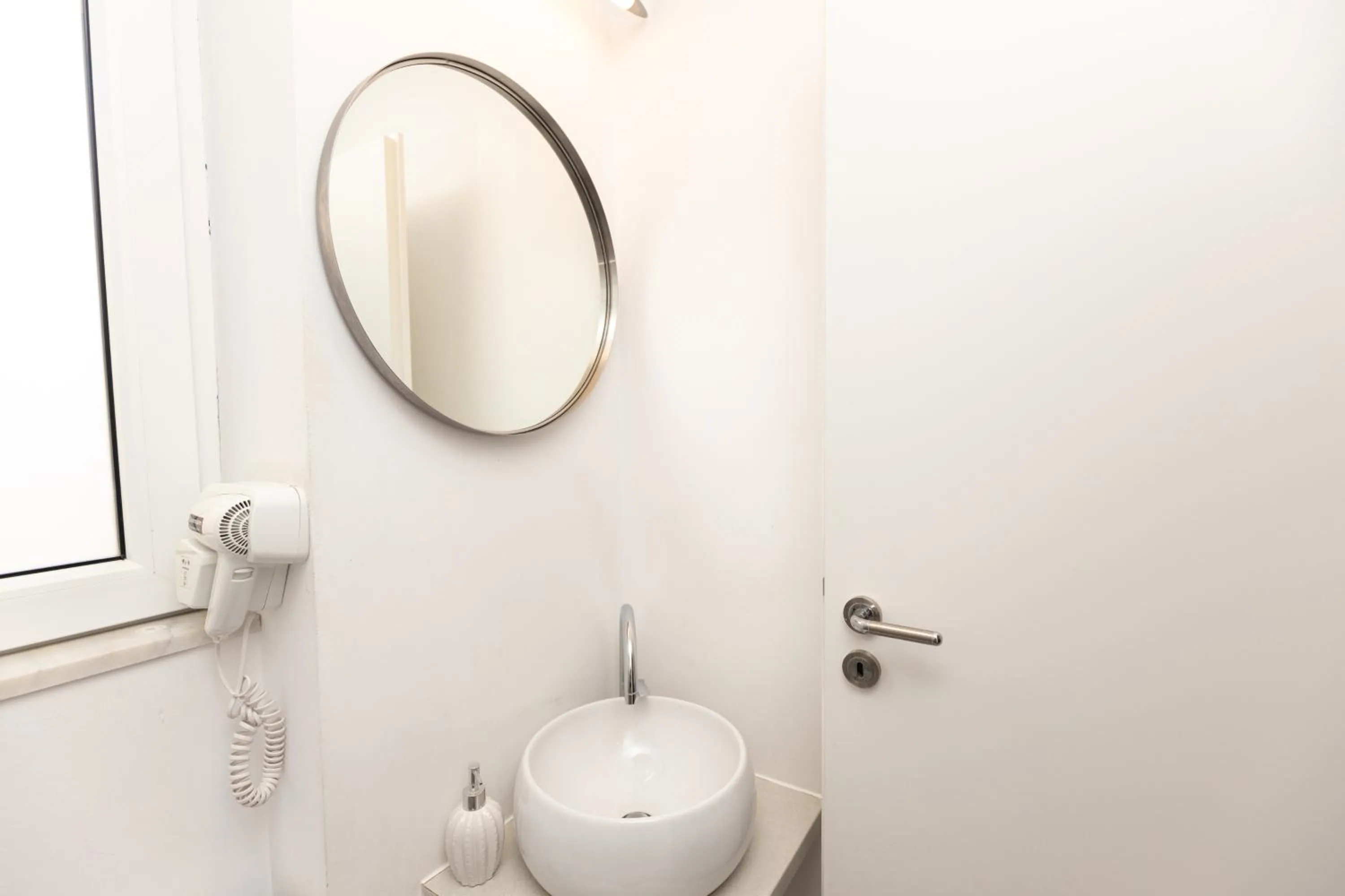 Bathroom in Metropole Apartments - Old City