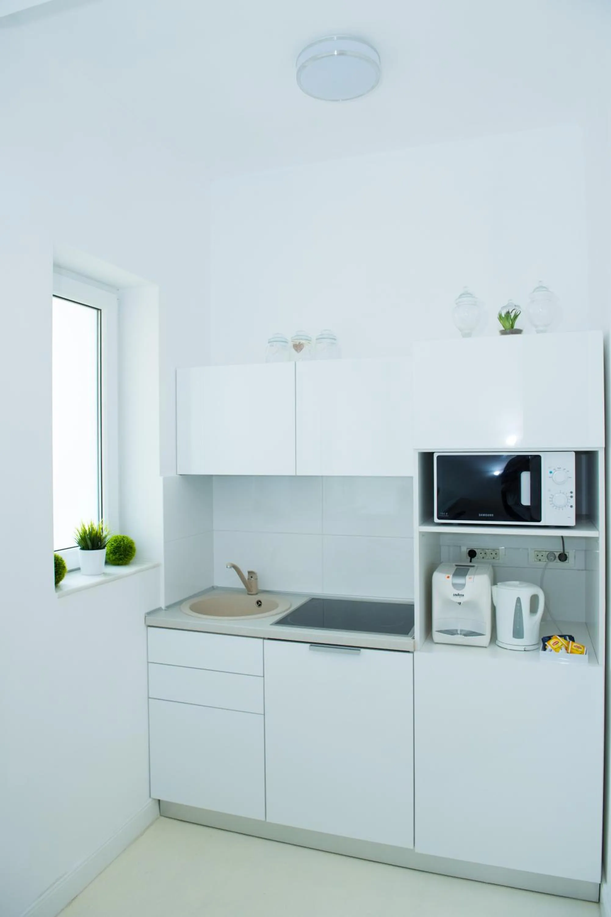 Kitchen or kitchenette in Metropole Apartments - Old City