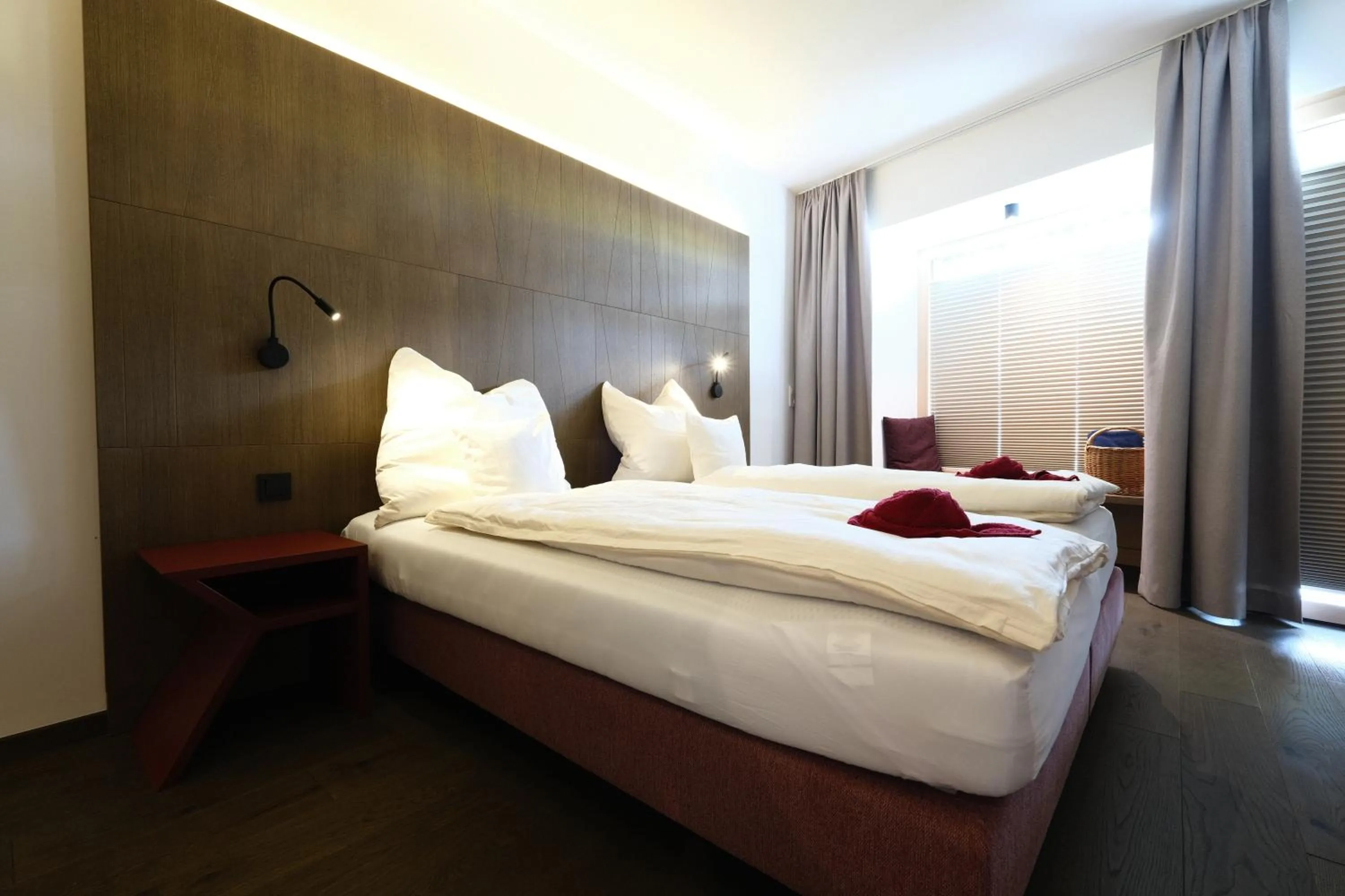 Bedroom, Bed in SeeHotel & SeeApartments Kärntnerhof- direkt am See!