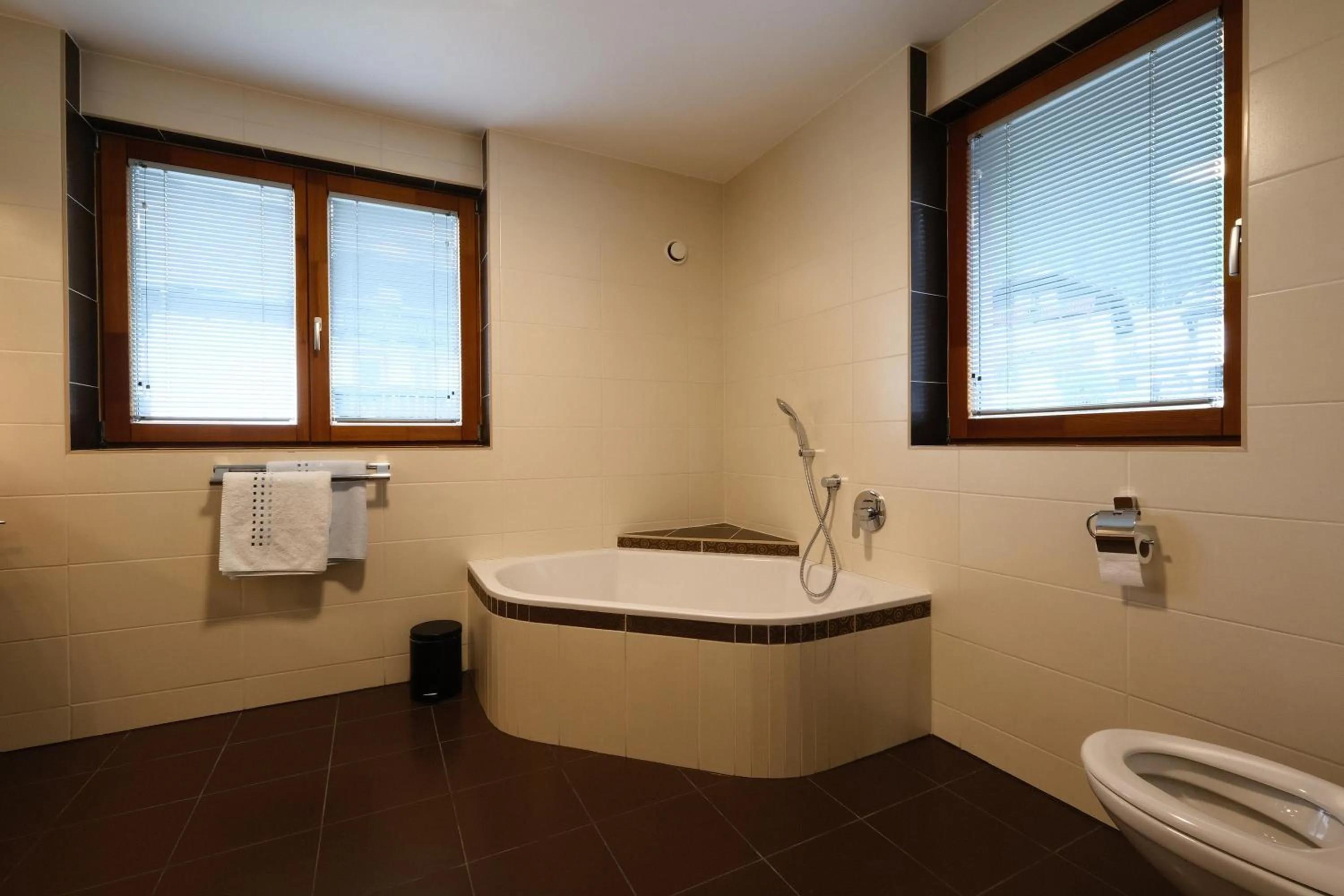 Bathroom in SeeHotel & SeeApartments Kärntnerhof- direkt am See!