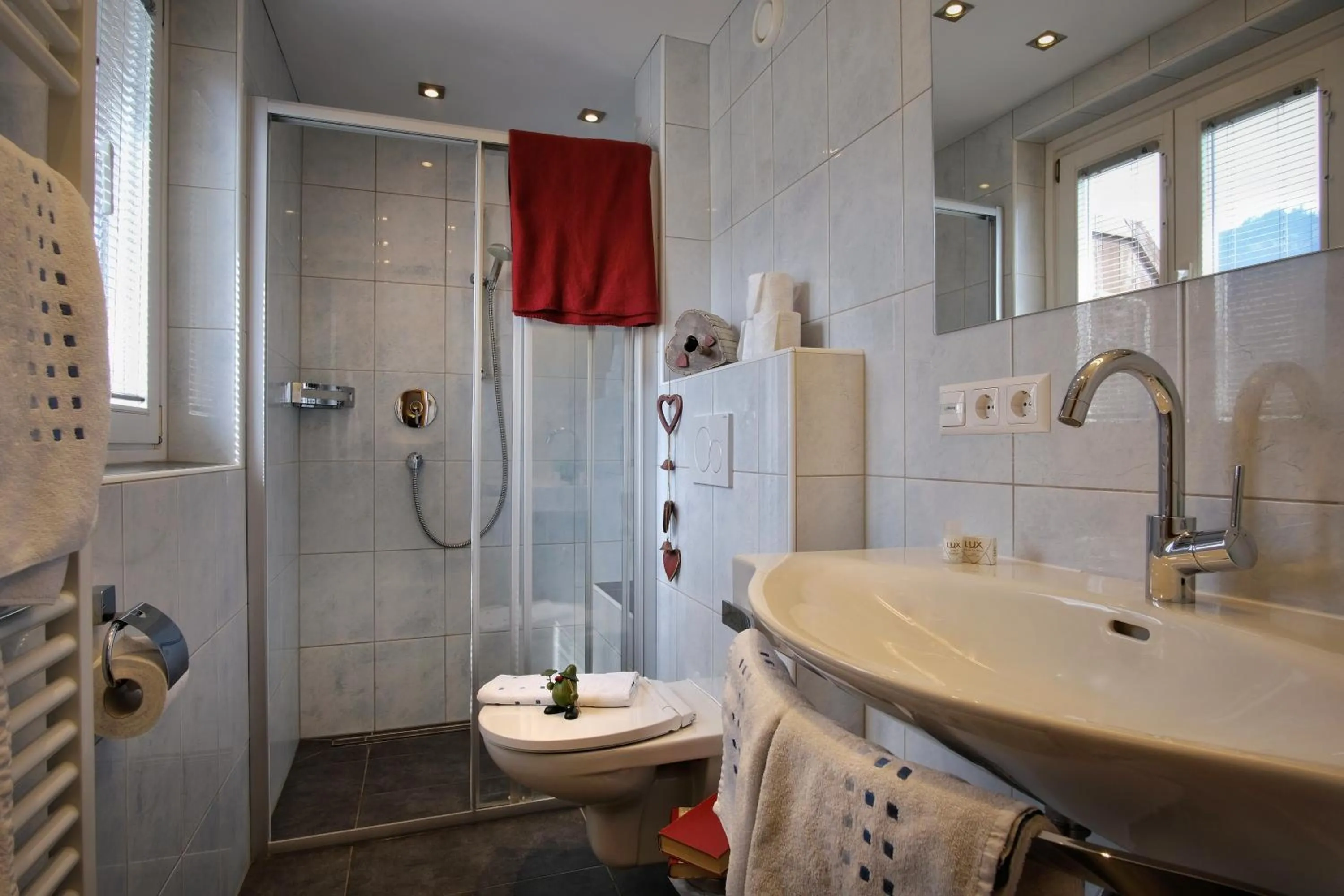 Bathroom in SeeHotel & SeeApartments Kärntnerhof- direkt am See!