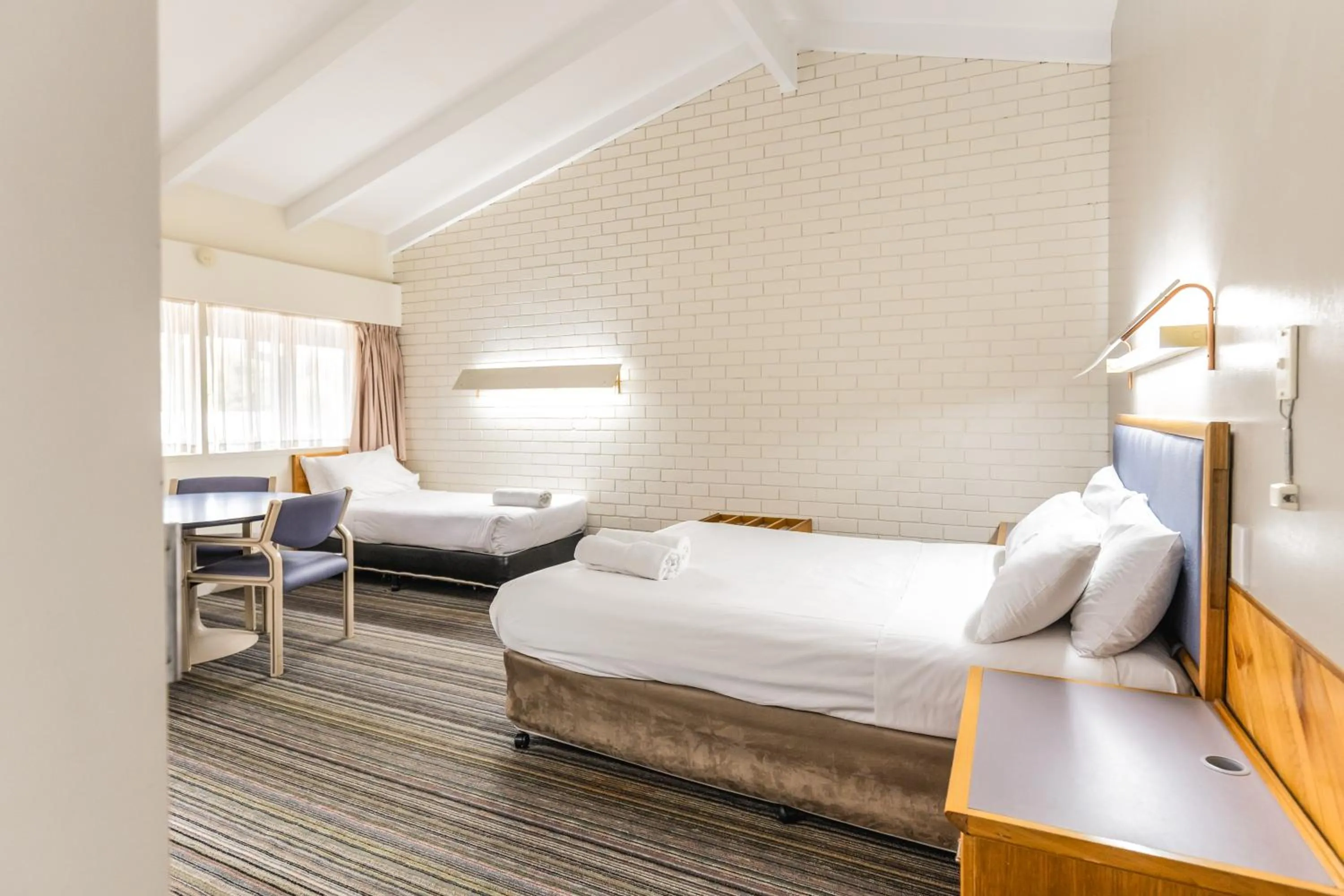 Bed in Wanderlight Motor Inn