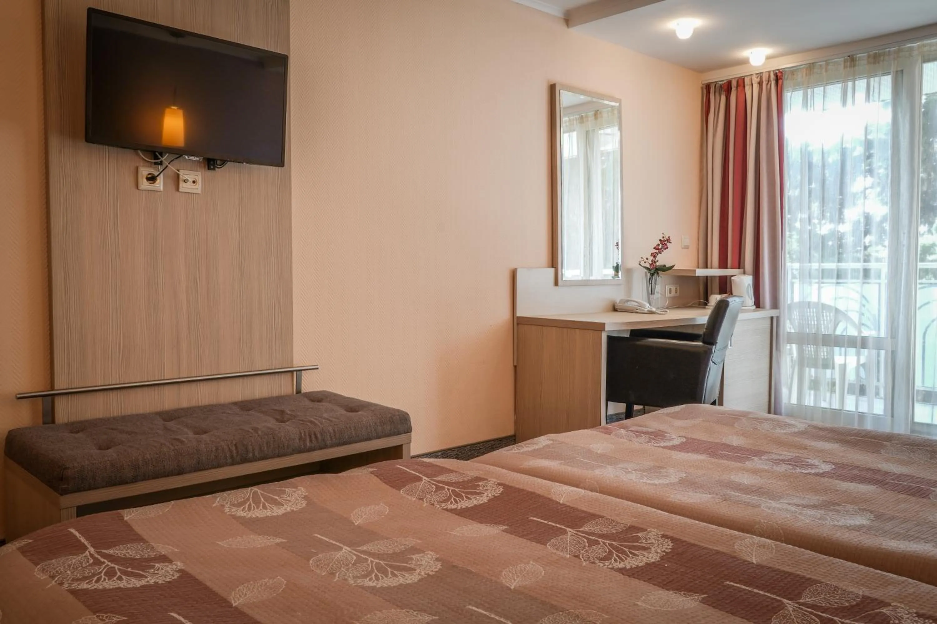 Bed in Hotel Sandy Beach