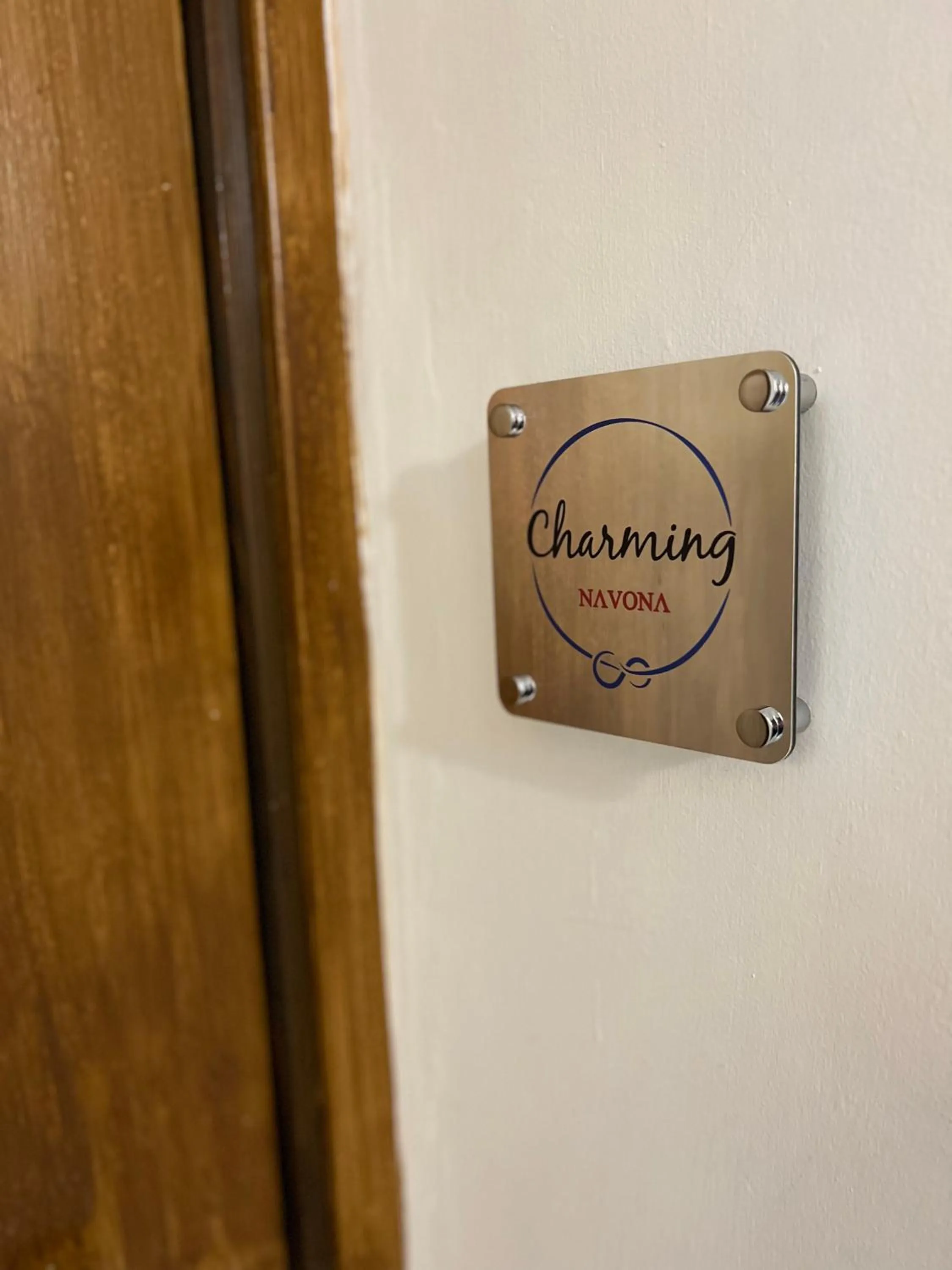 Property logo or sign in Charming Navona