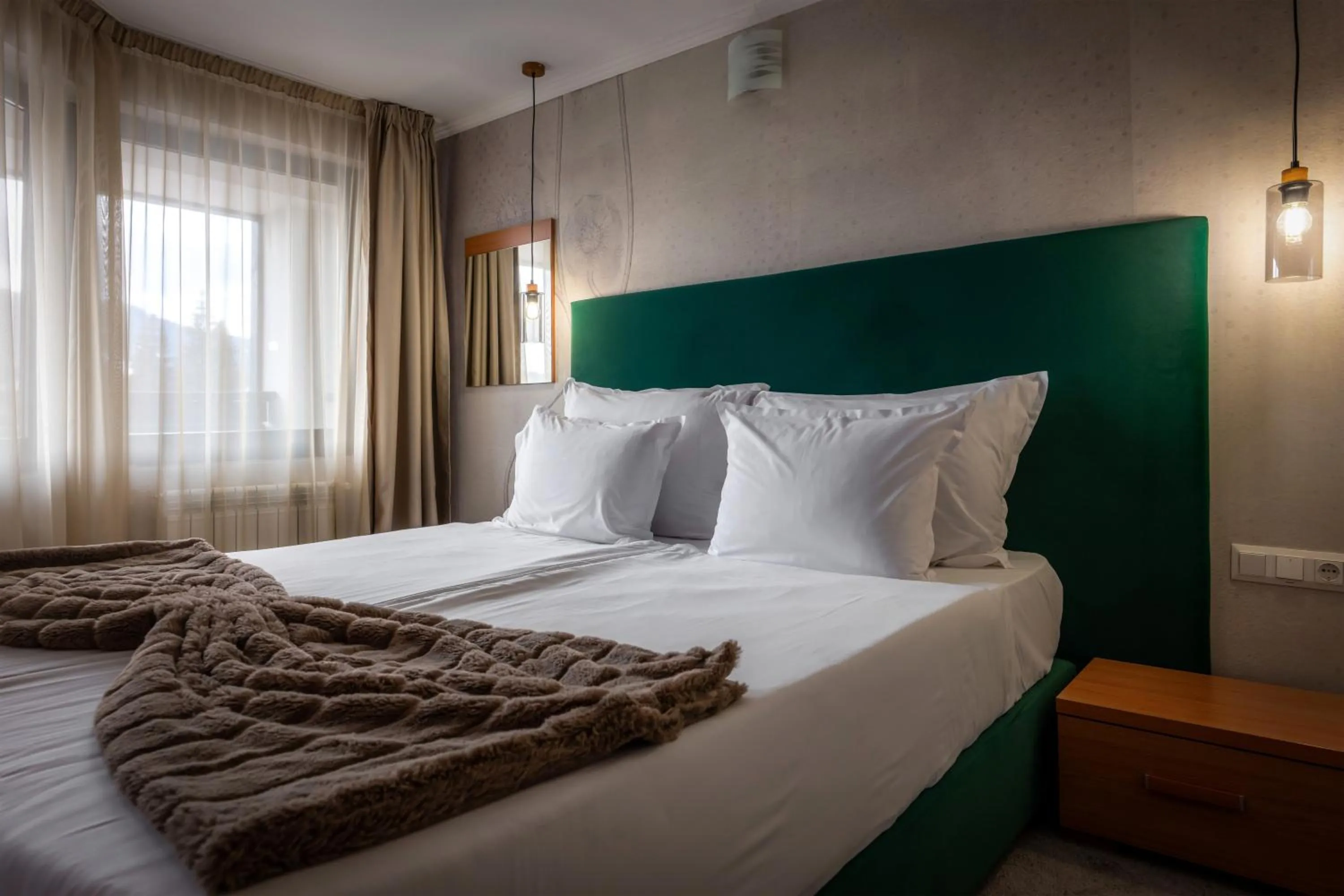 Bed in Snezhanka Hotel Pamporovo - Half Board & Swimming pool