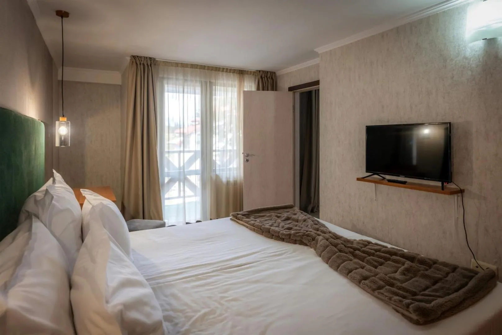 Bed in Snezhanka Hotel Pamporovo - Half Board & Swimming pool