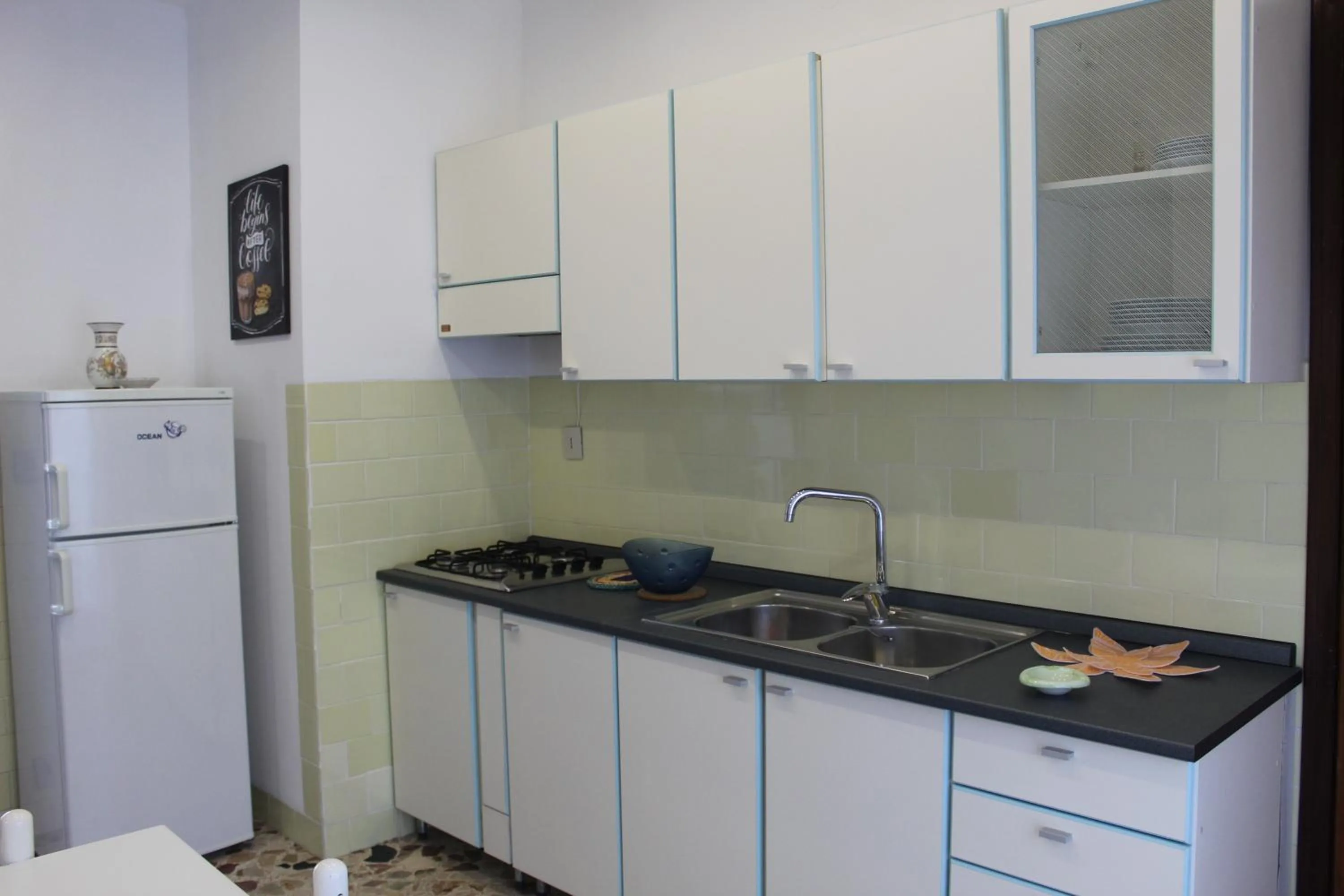 Kitchen or kitchenette in Appartamenti Via Marconi