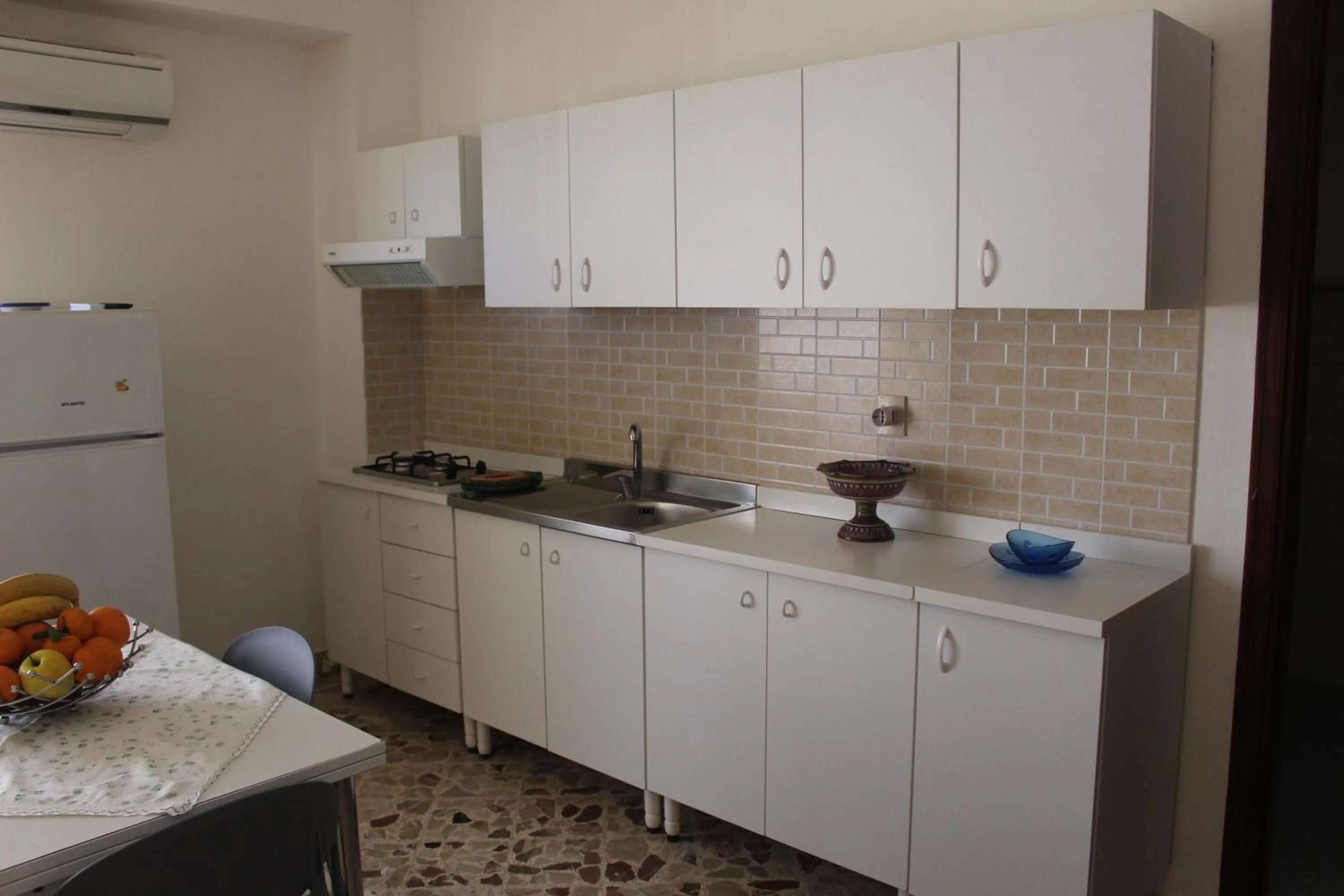 Kitchen or kitchenette in Appartamenti Via Marconi