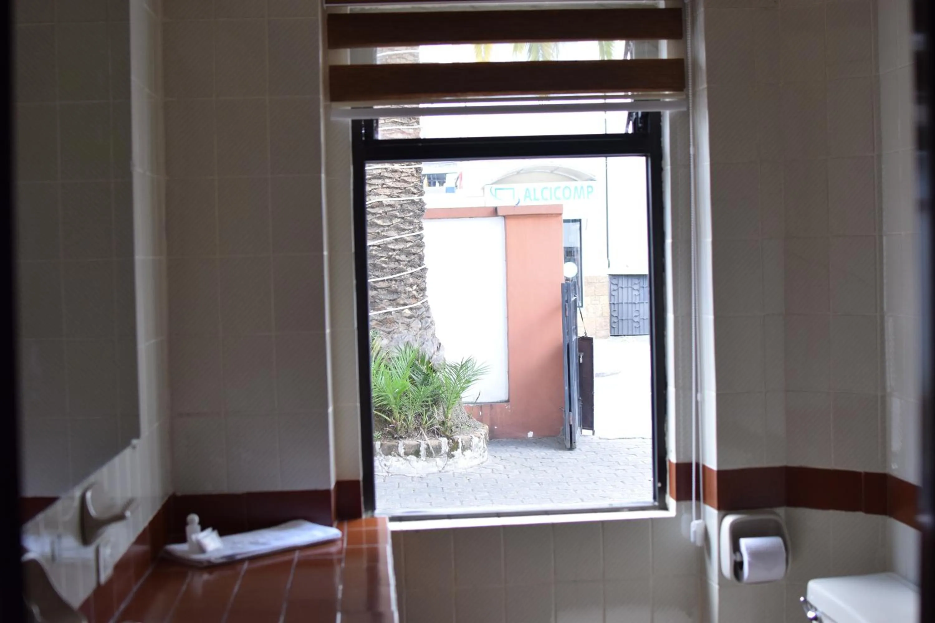 Property building, Bed in Hotel Ambassador