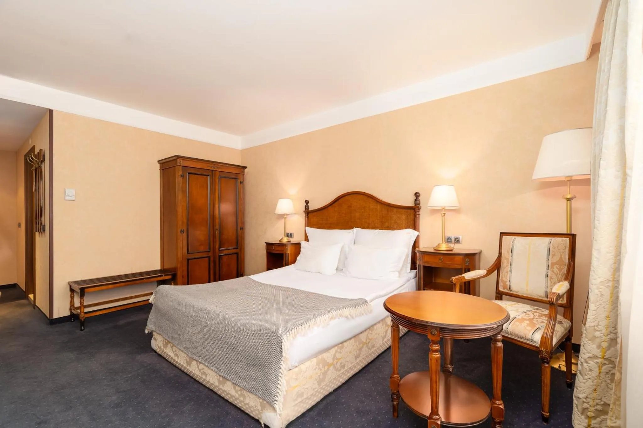 Bed in Festa Winter Palace Hotel