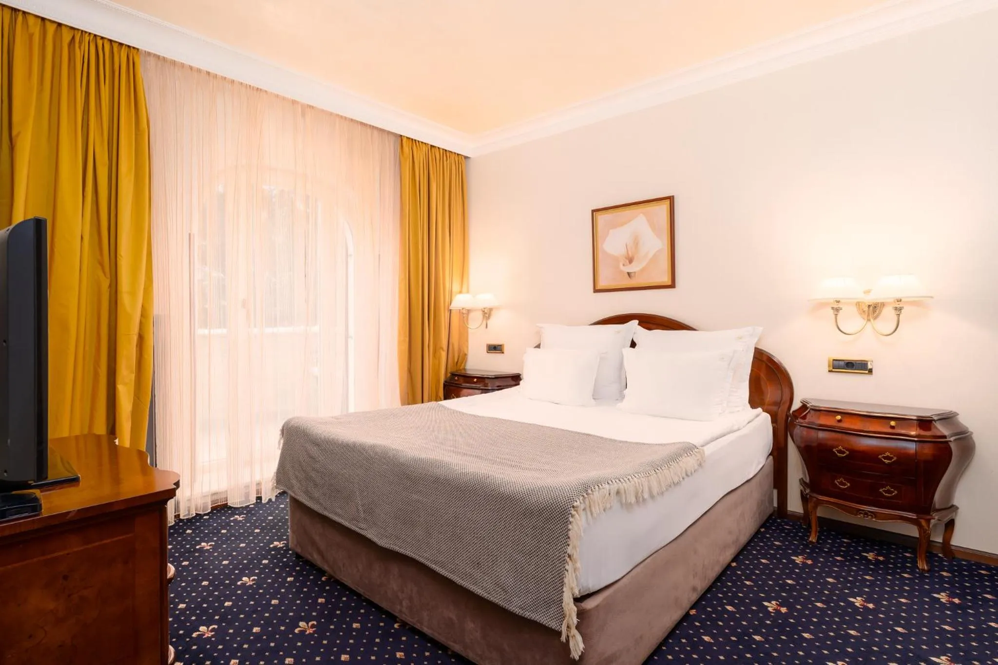 Bed in Festa Winter Palace Hotel