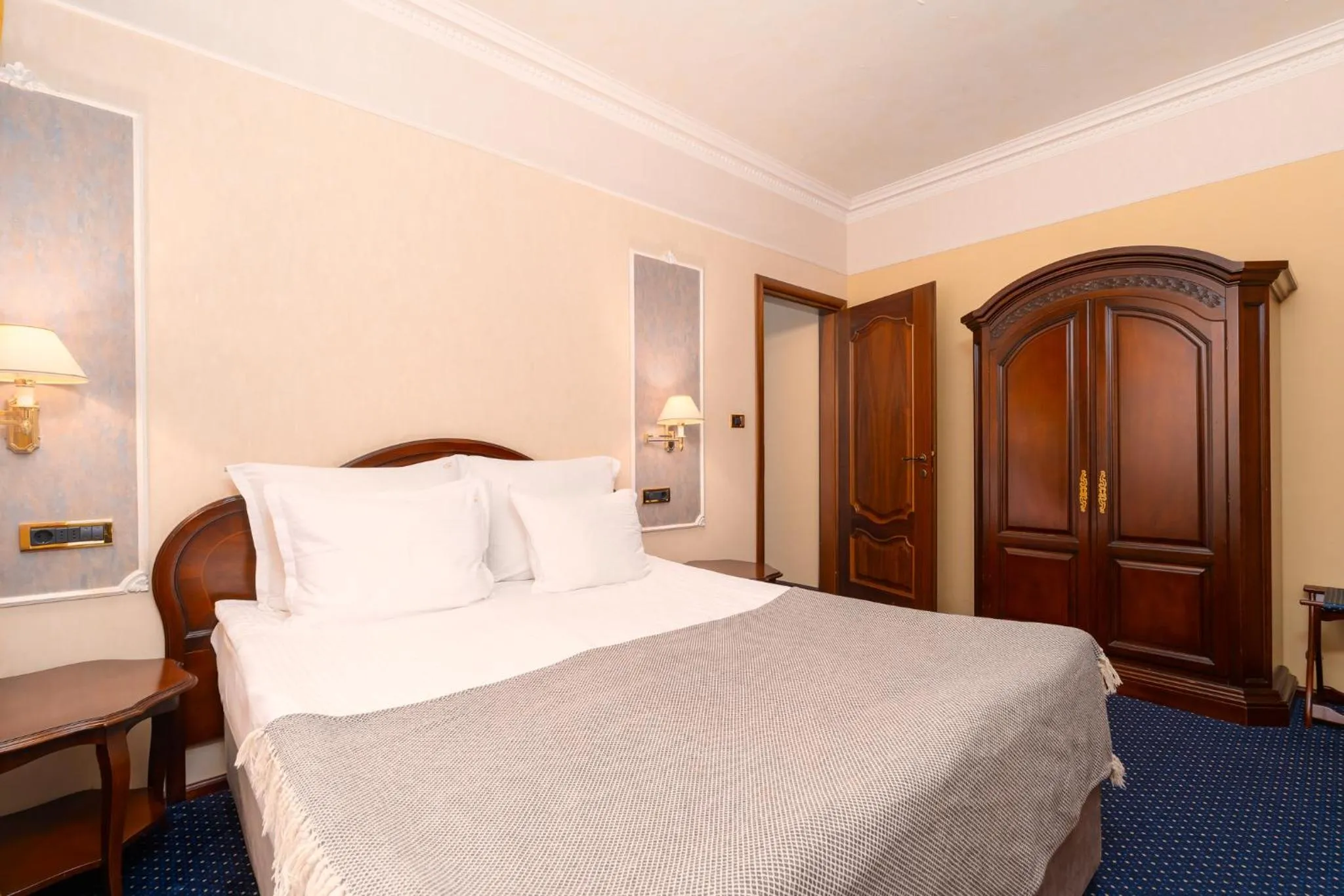 Bed in Festa Winter Palace Hotel