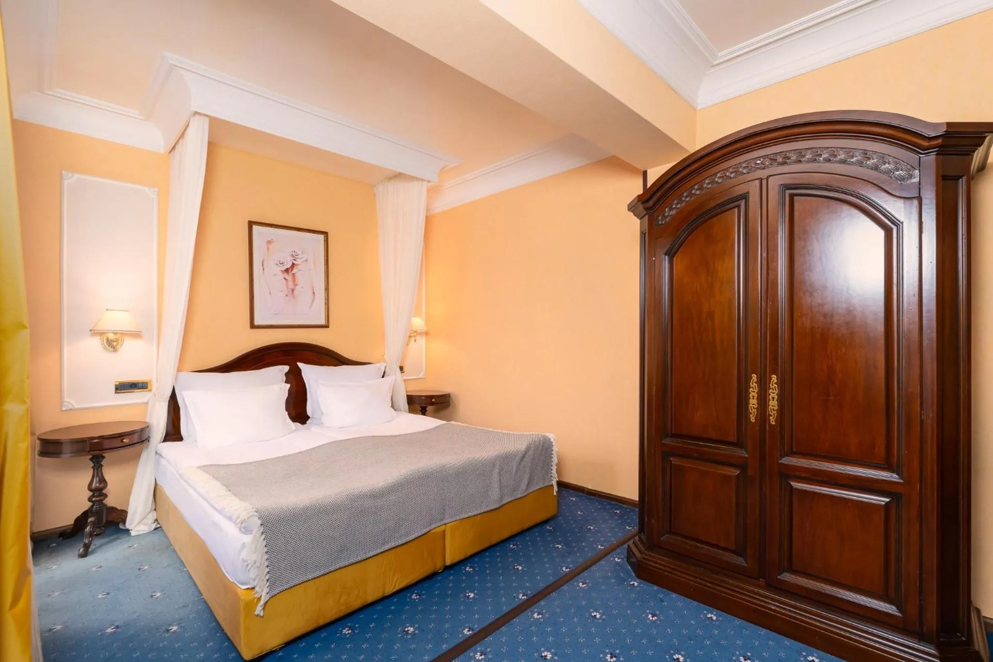 Bed in Festa Winter Palace Hotel