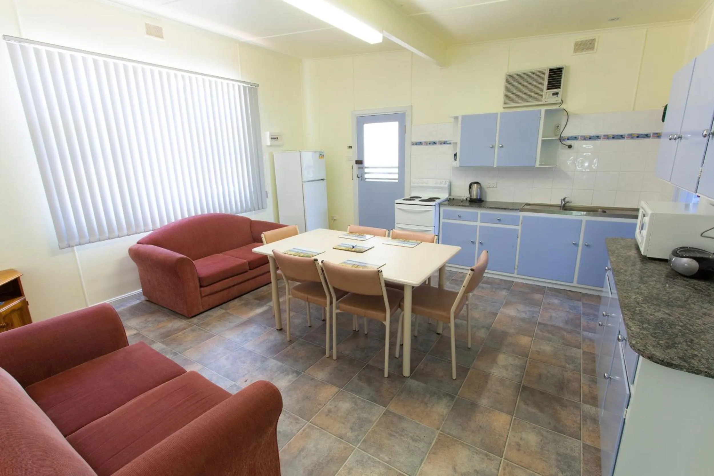 Kitchen or kitchenette in Modra's Apartments