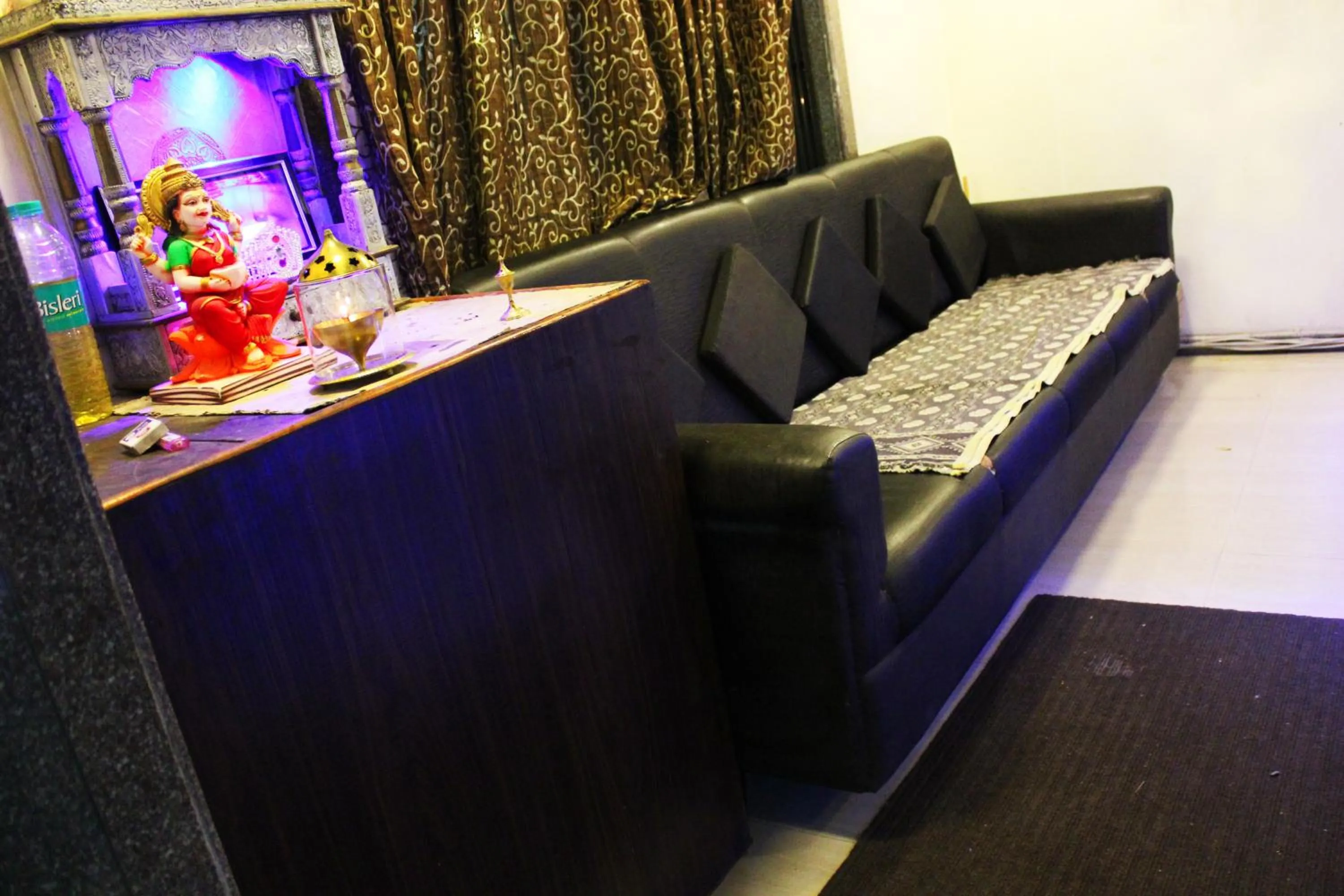 Communal lounge/ TV room in Sai Atithi Resort