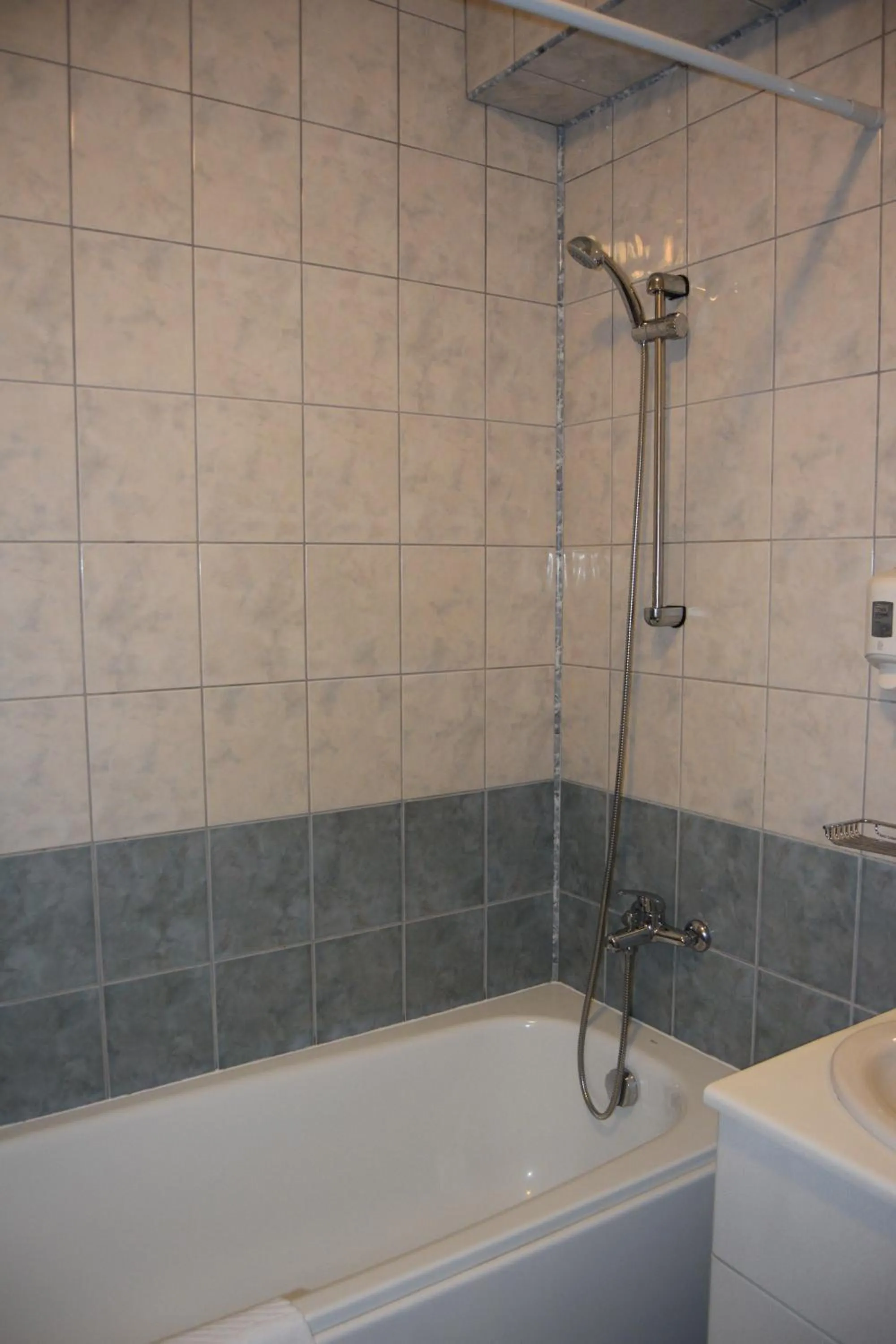 Bathroom in Persey Flora Apartments