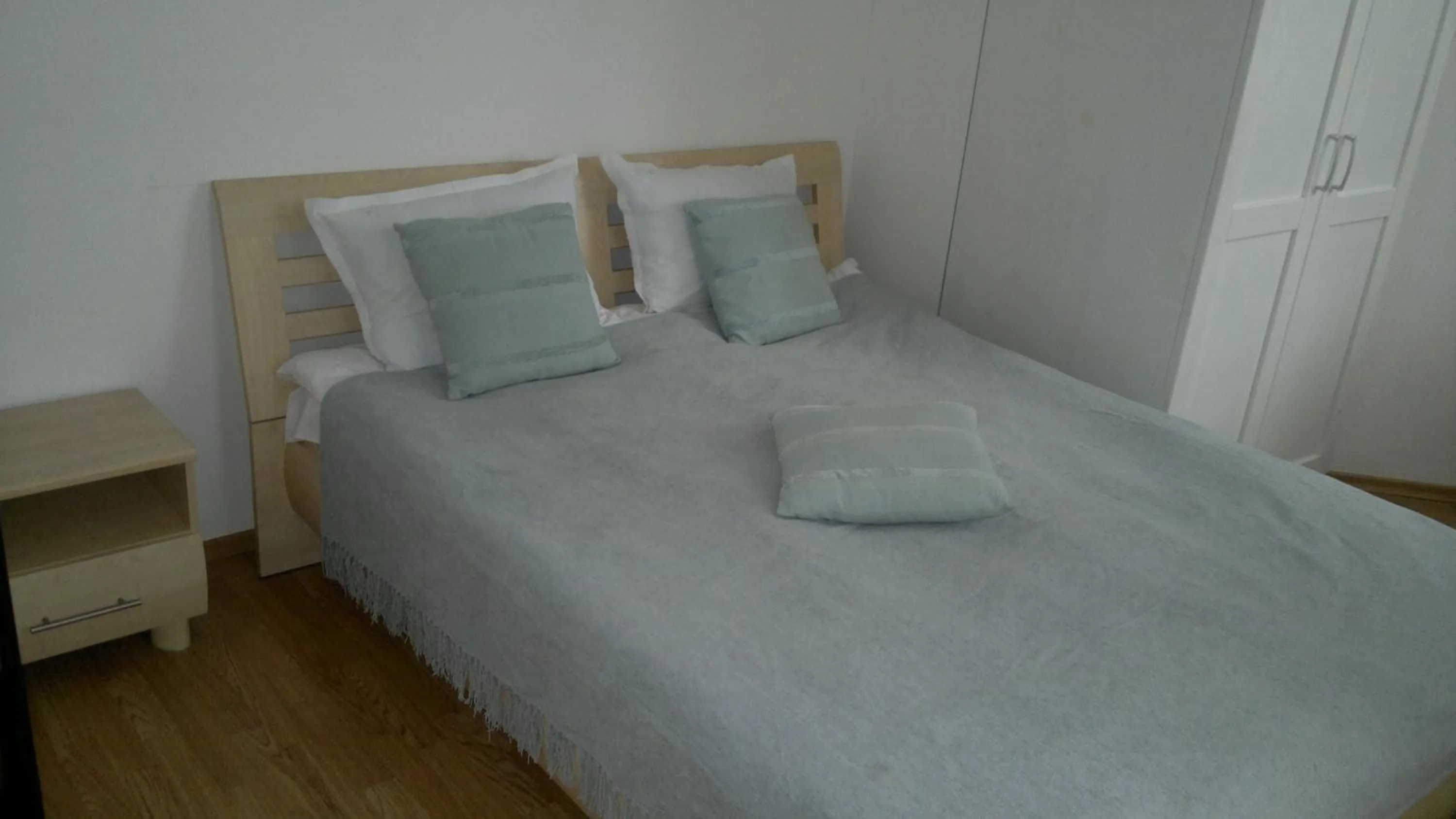 Bed in Persey Flora Apartments