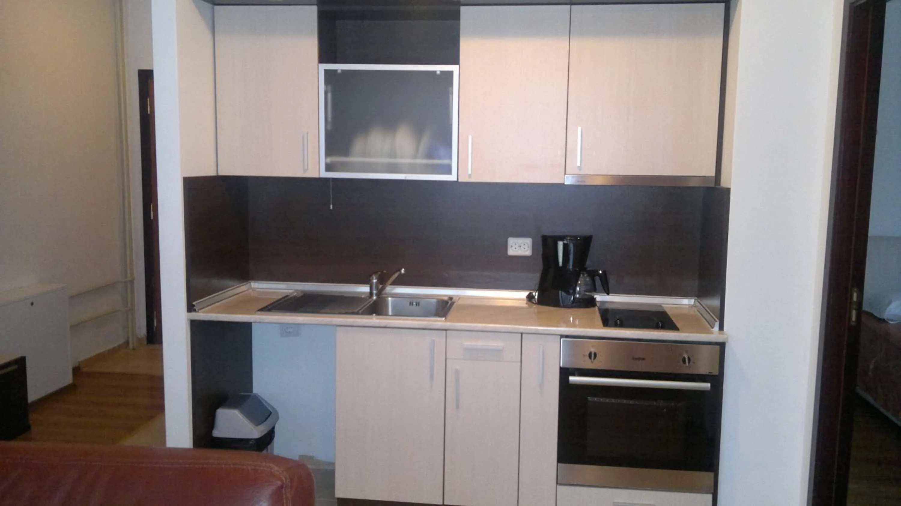 Kitchen or kitchenette in Persey Flora Apartments