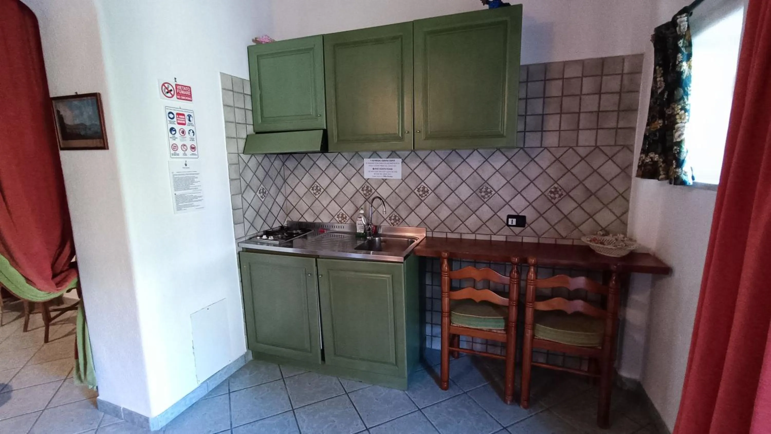 Kitchen or kitchenette in Residence Villa Cristina