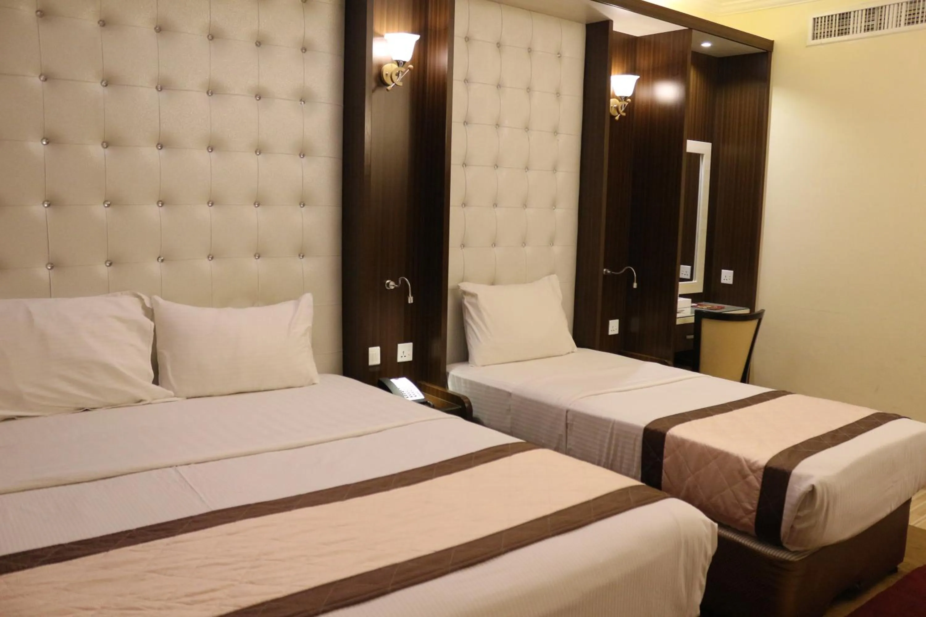 Bed in Al Khaleej Grand Hotel