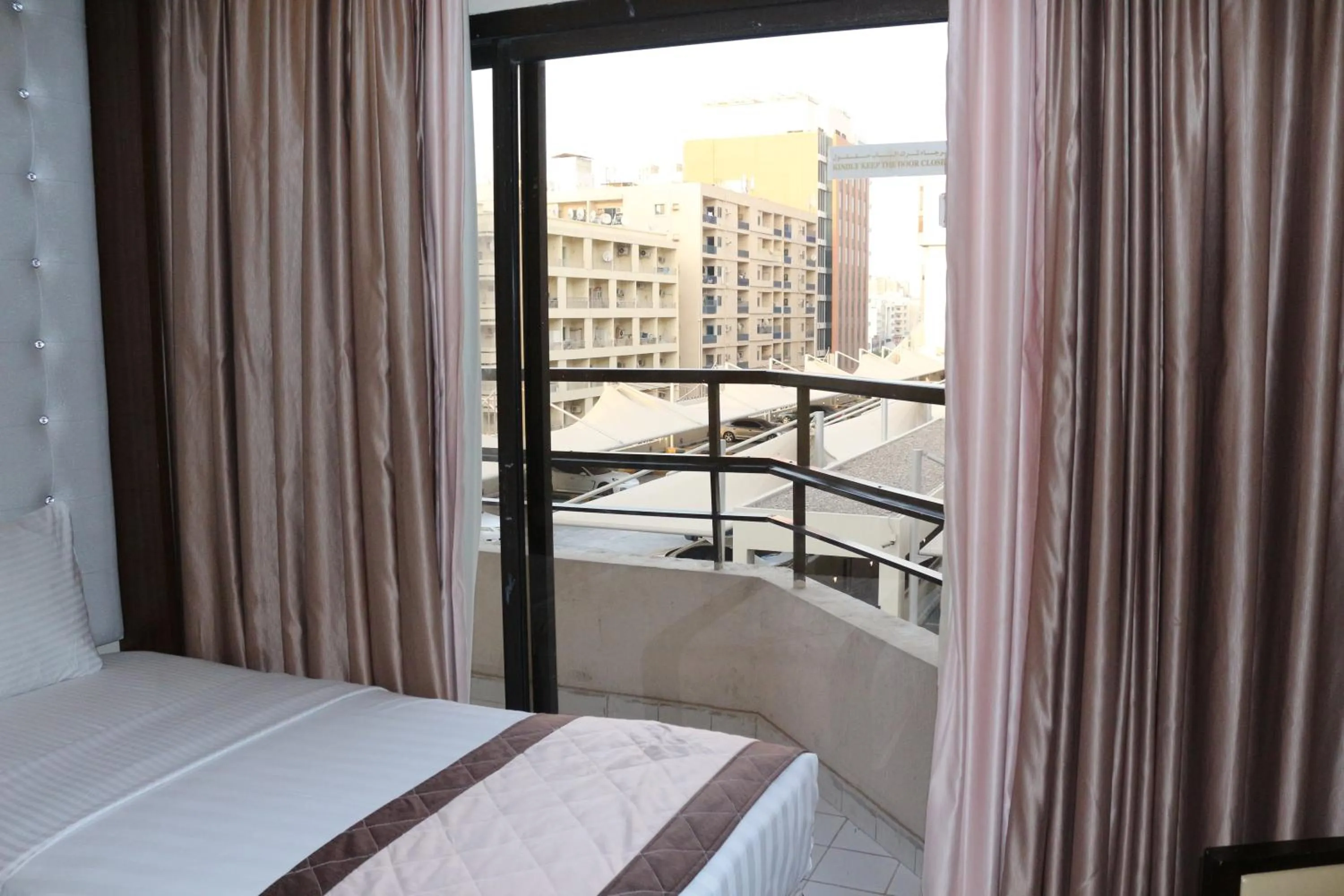 Bed in Al Khaleej Grand Hotel