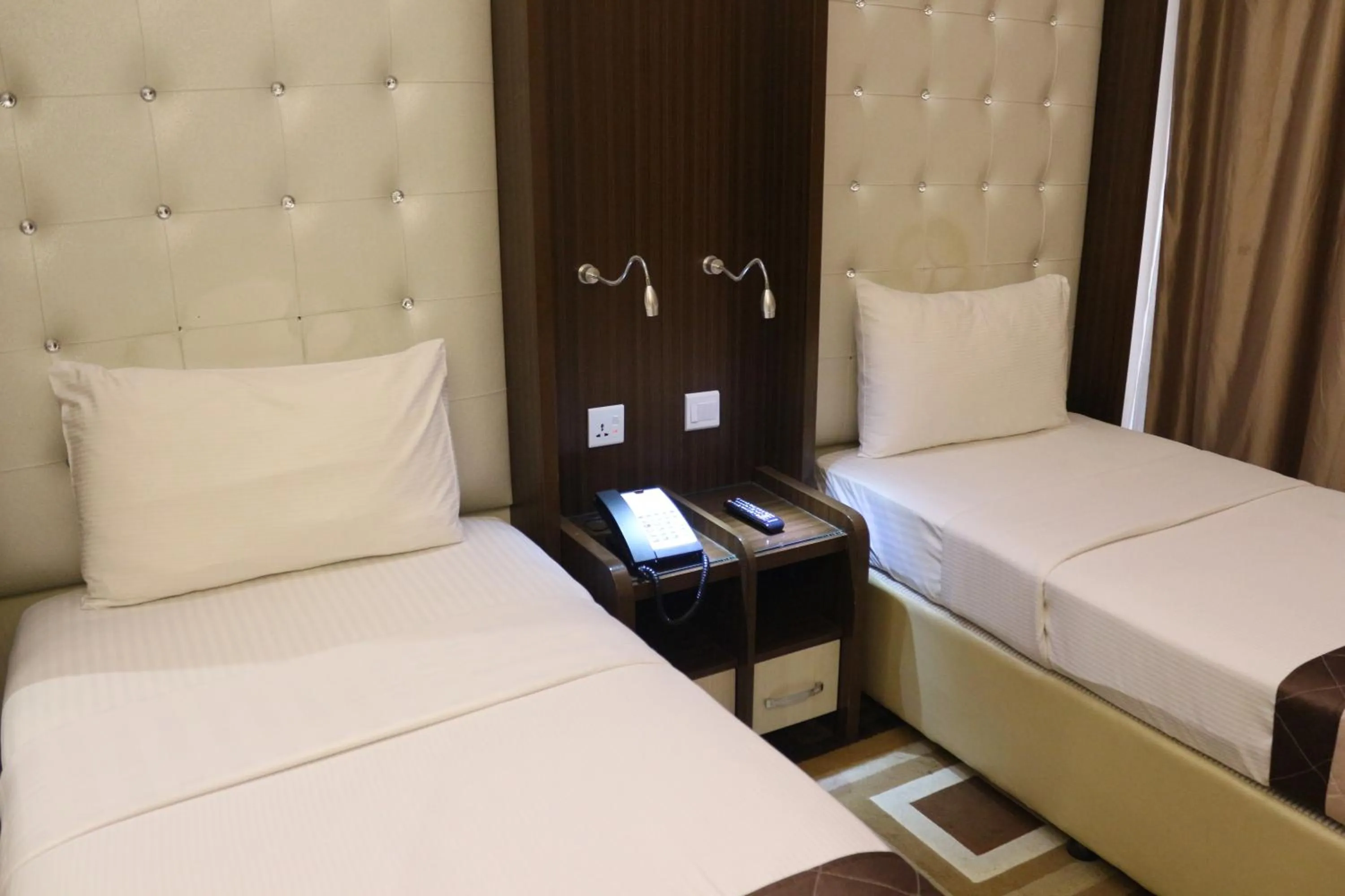 Bed in Al Khaleej Grand Hotel