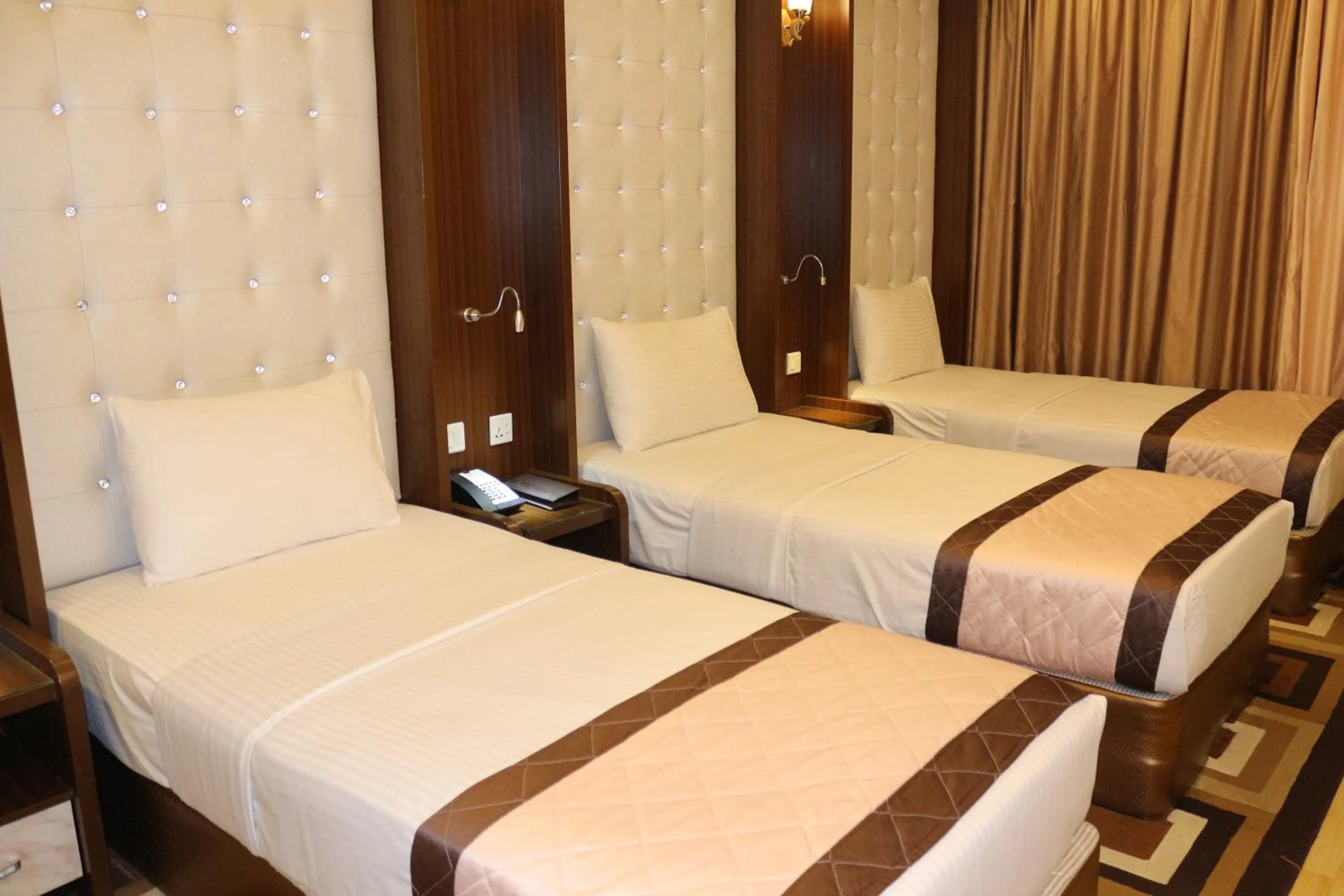 Bed in Al Khaleej Grand Hotel