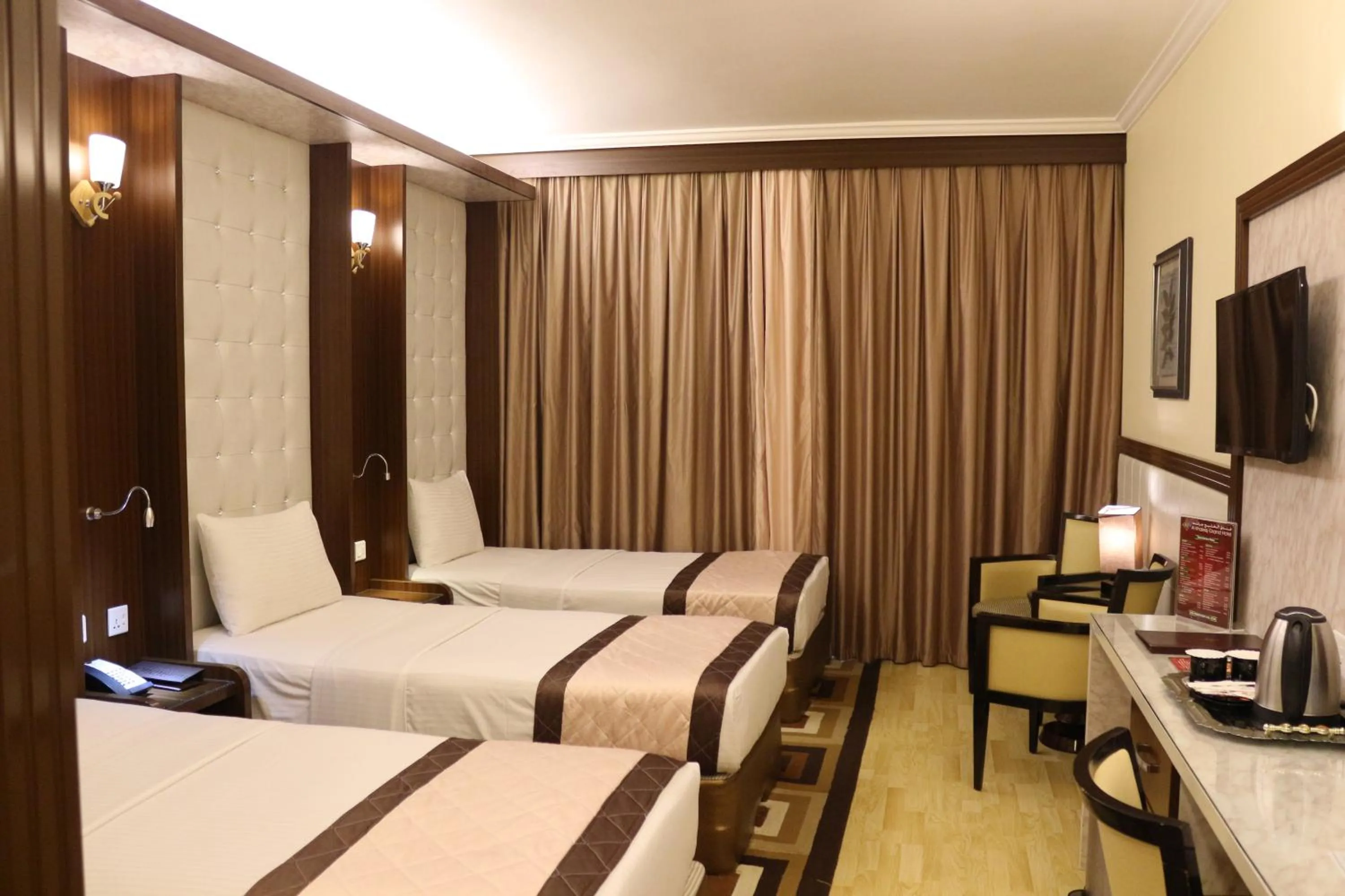 Bed in Al Khaleej Grand Hotel