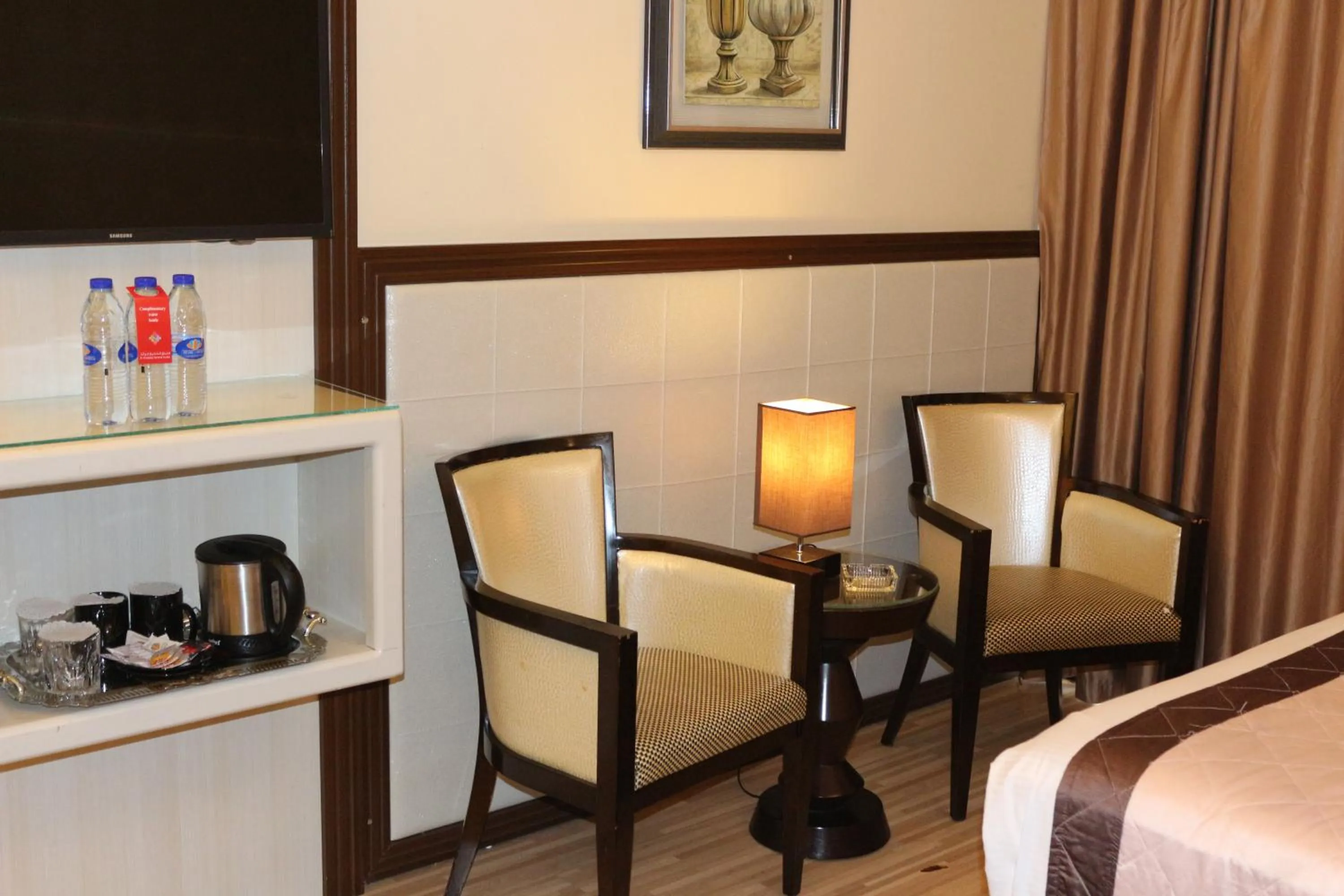 Seating area, Bed in Al Khaleej Grand Hotel