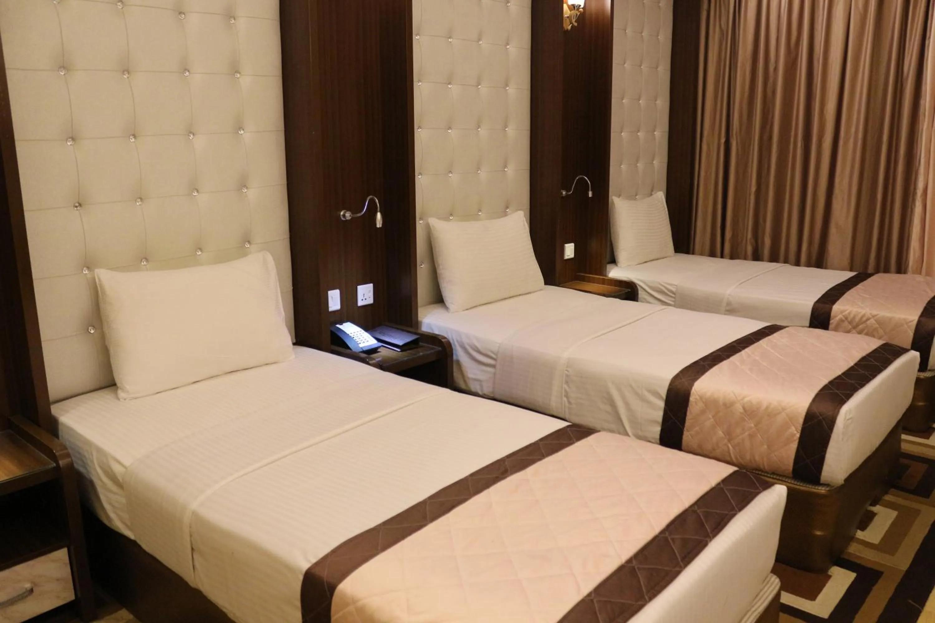 Bed in Al Khaleej Grand Hotel