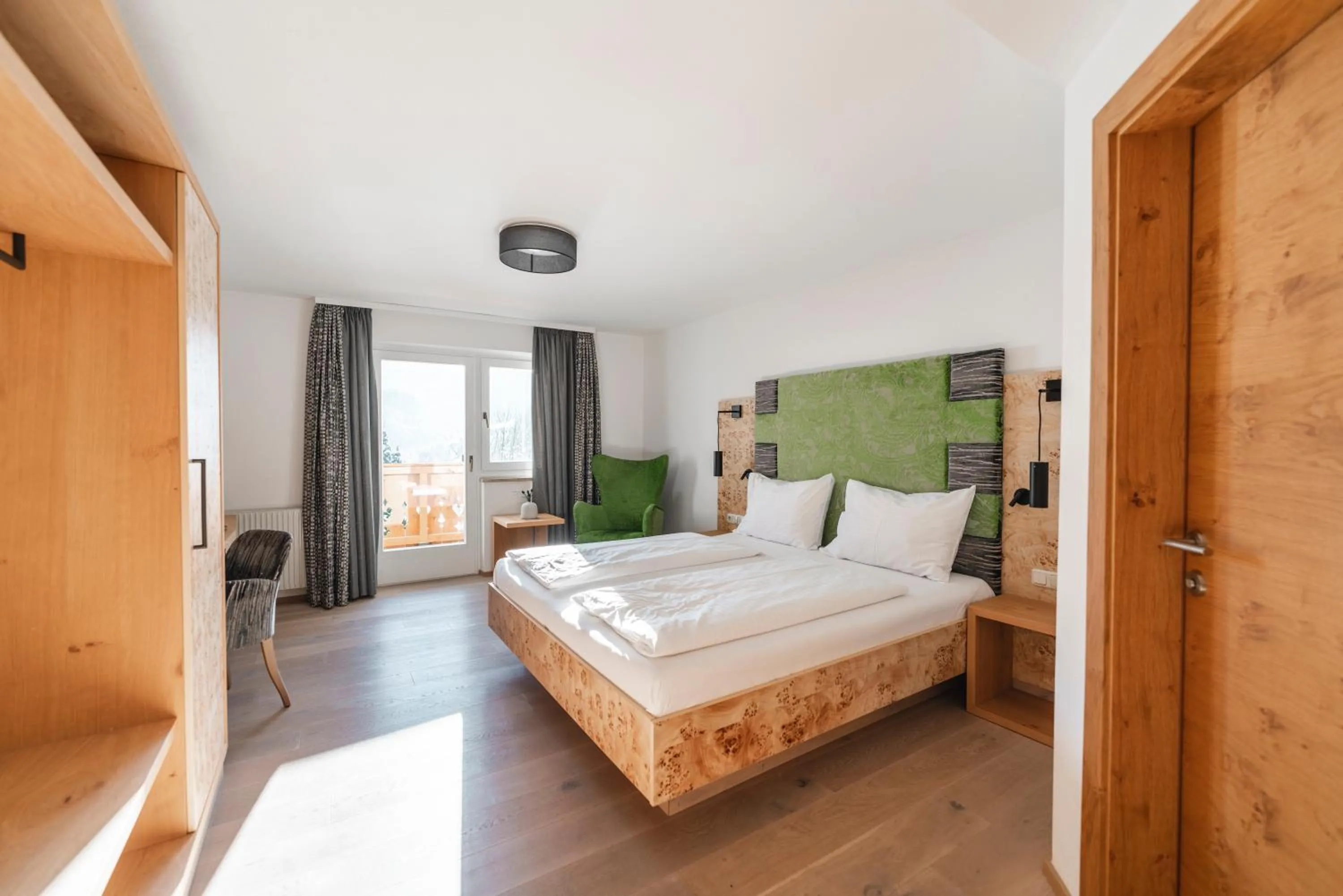 Photo of the whole room, Bed in Genusshotel Fichtenhof