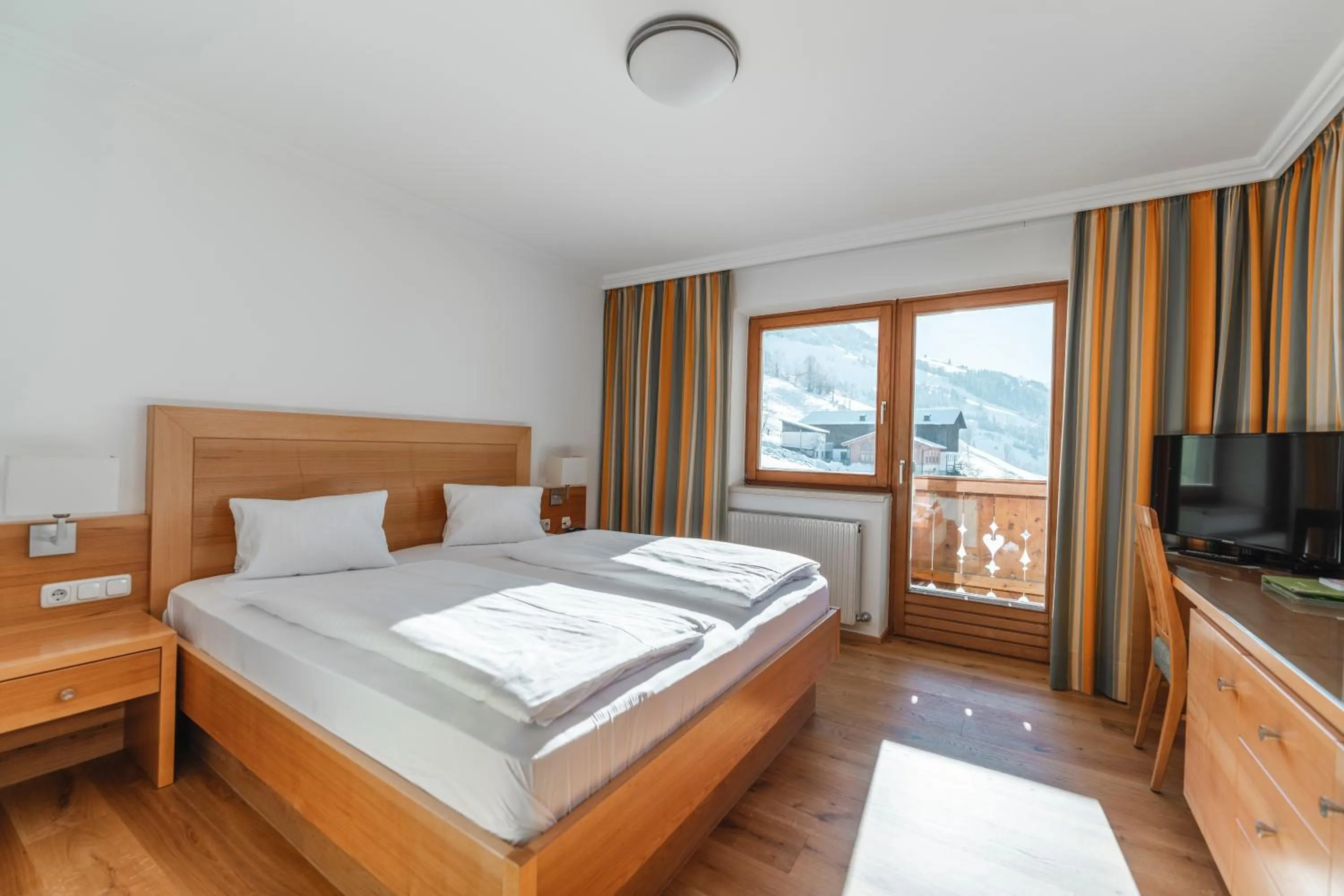 Photo of the whole room, Bed in Genusshotel Fichtenhof