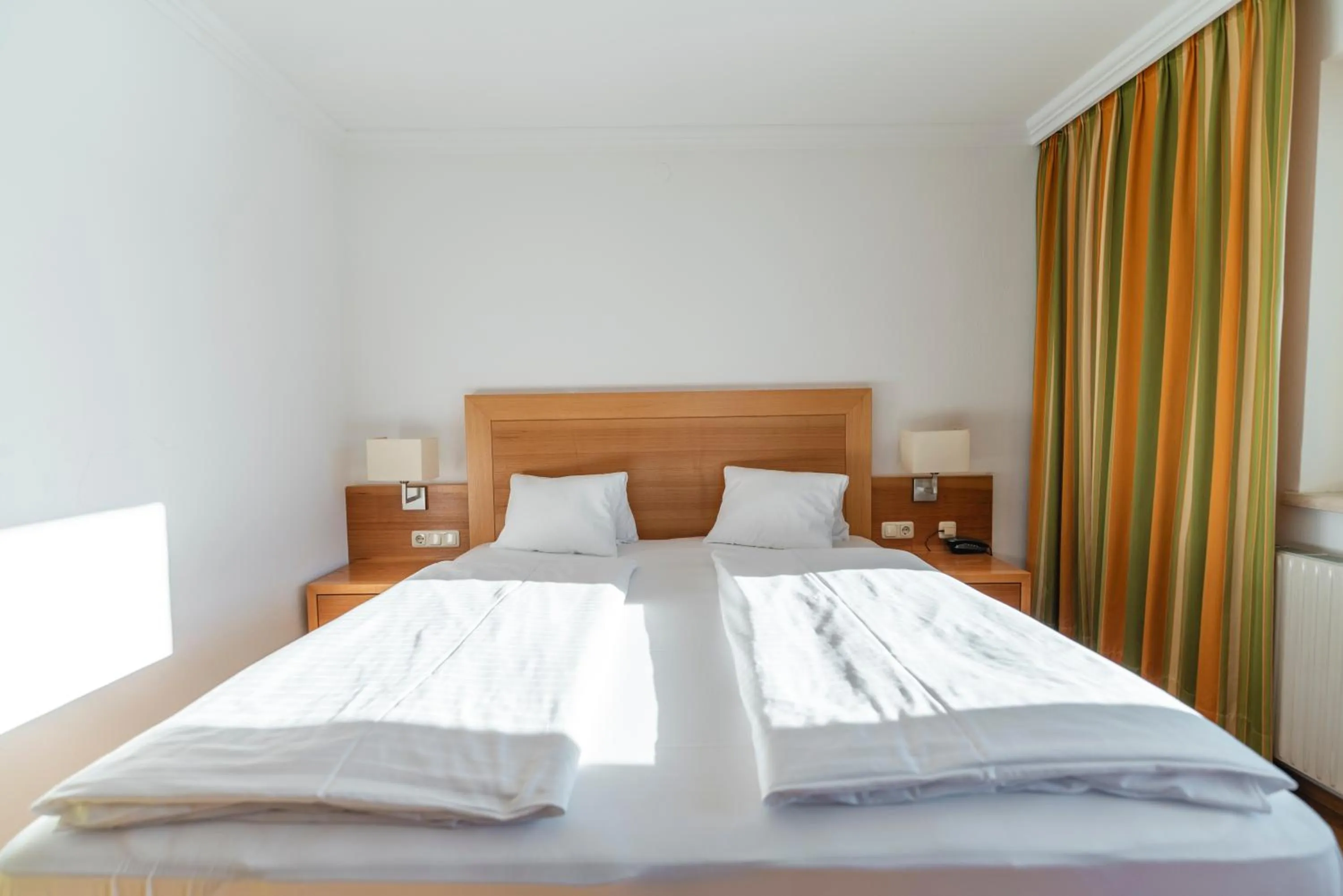 Photo of the whole room, Bed in Genusshotel Fichtenhof