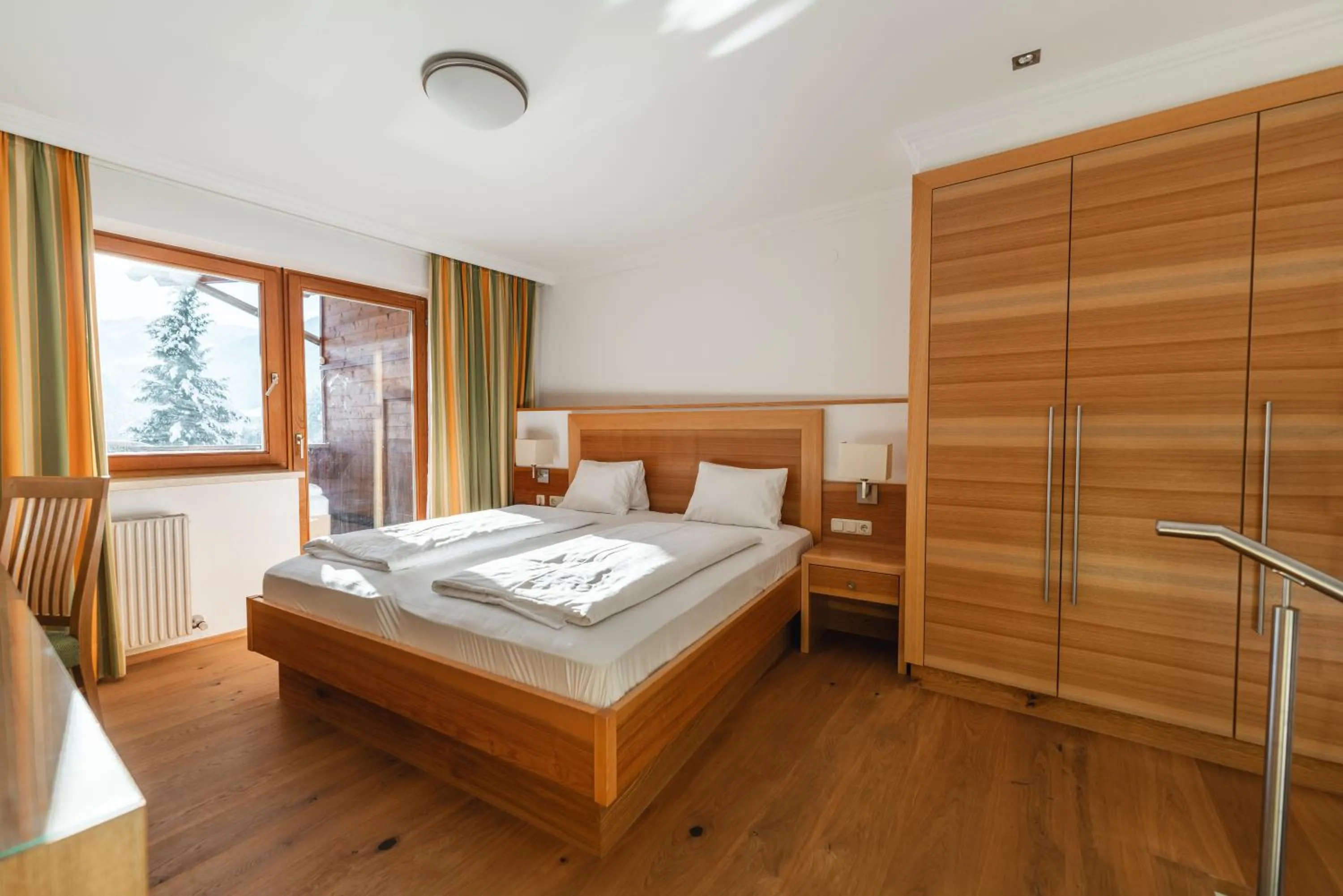 Photo of the whole room, Bed in Genusshotel Fichtenhof