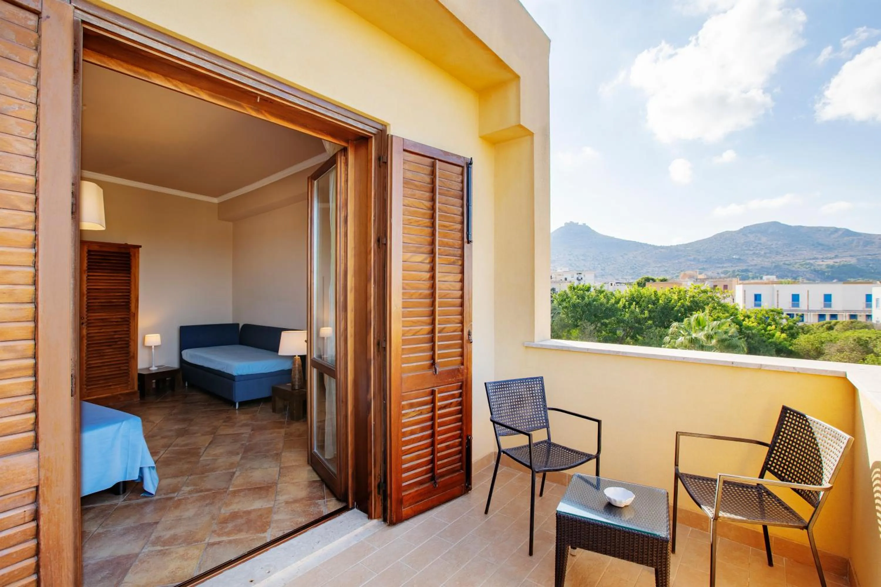 Balcony/Terrace, Bed in FAVIGNANA HOTEL Concept Holiday