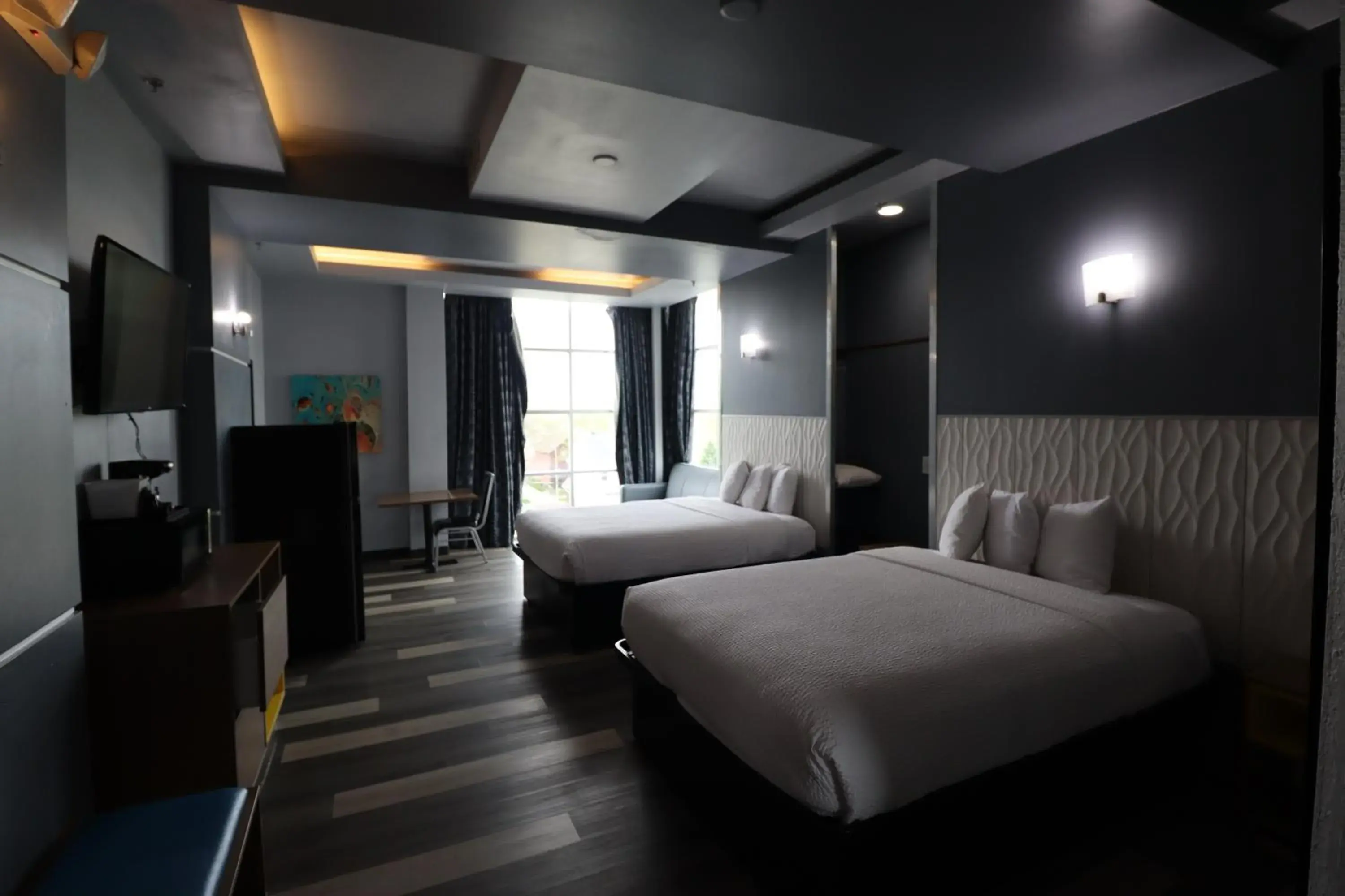 Bed in Days Inn & Suites by Wyndham Milwaukee Bed in Days Inn & Suites by Wyndham Milwaukee