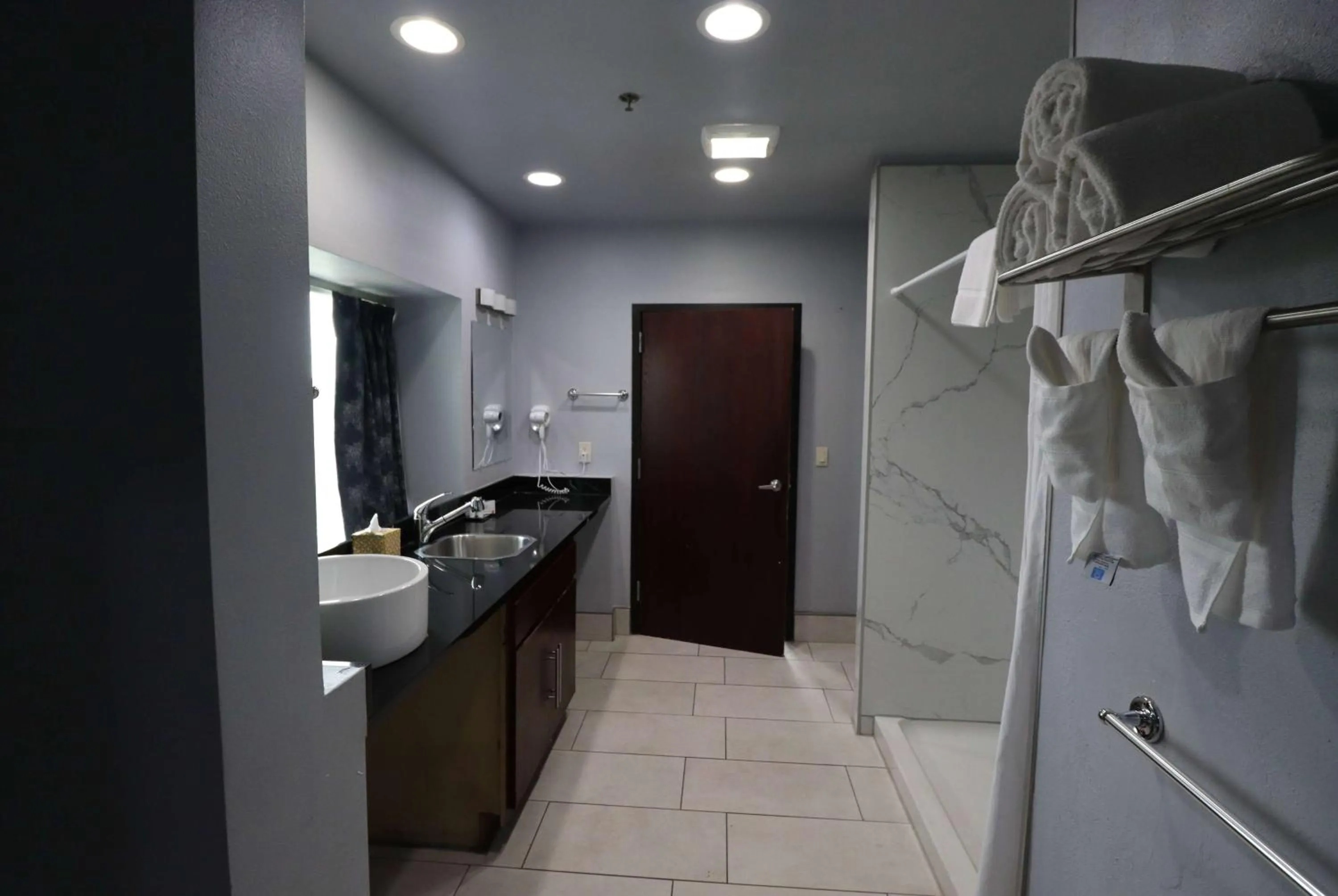 Bathroom in Days Inn & Suites by Wyndham Milwaukee