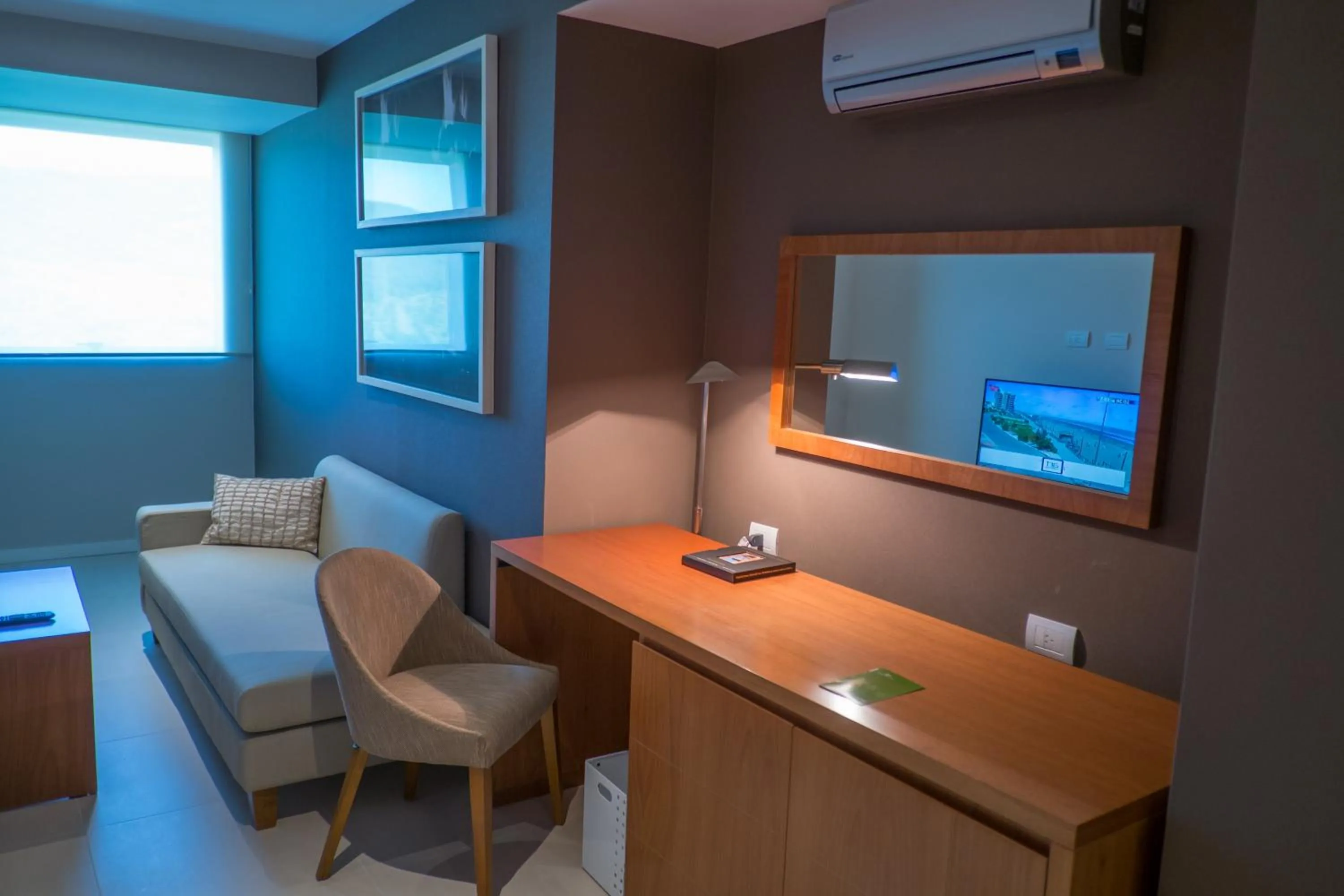 Photo of the whole room in Orfeo Suites Hotel Sierras Chicas