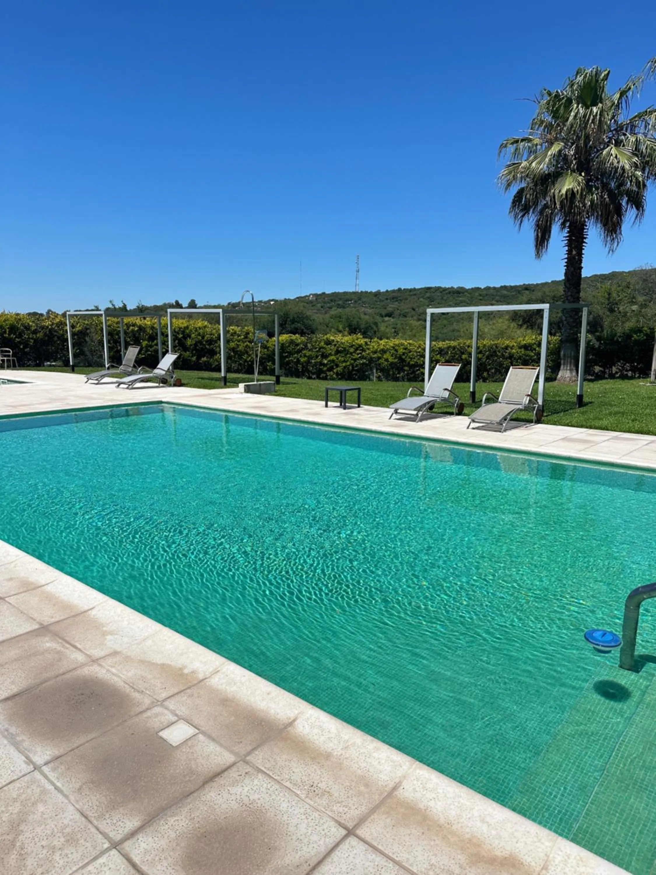 Swimming pool in Orfeo Suites Hotel Sierras Chicas