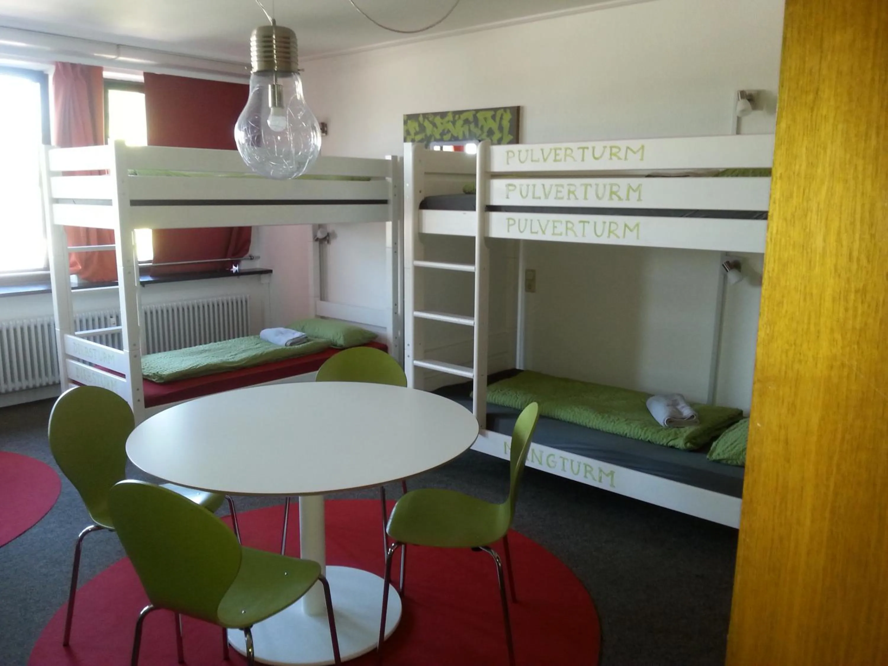 Dining area, Bed in Inselhostel