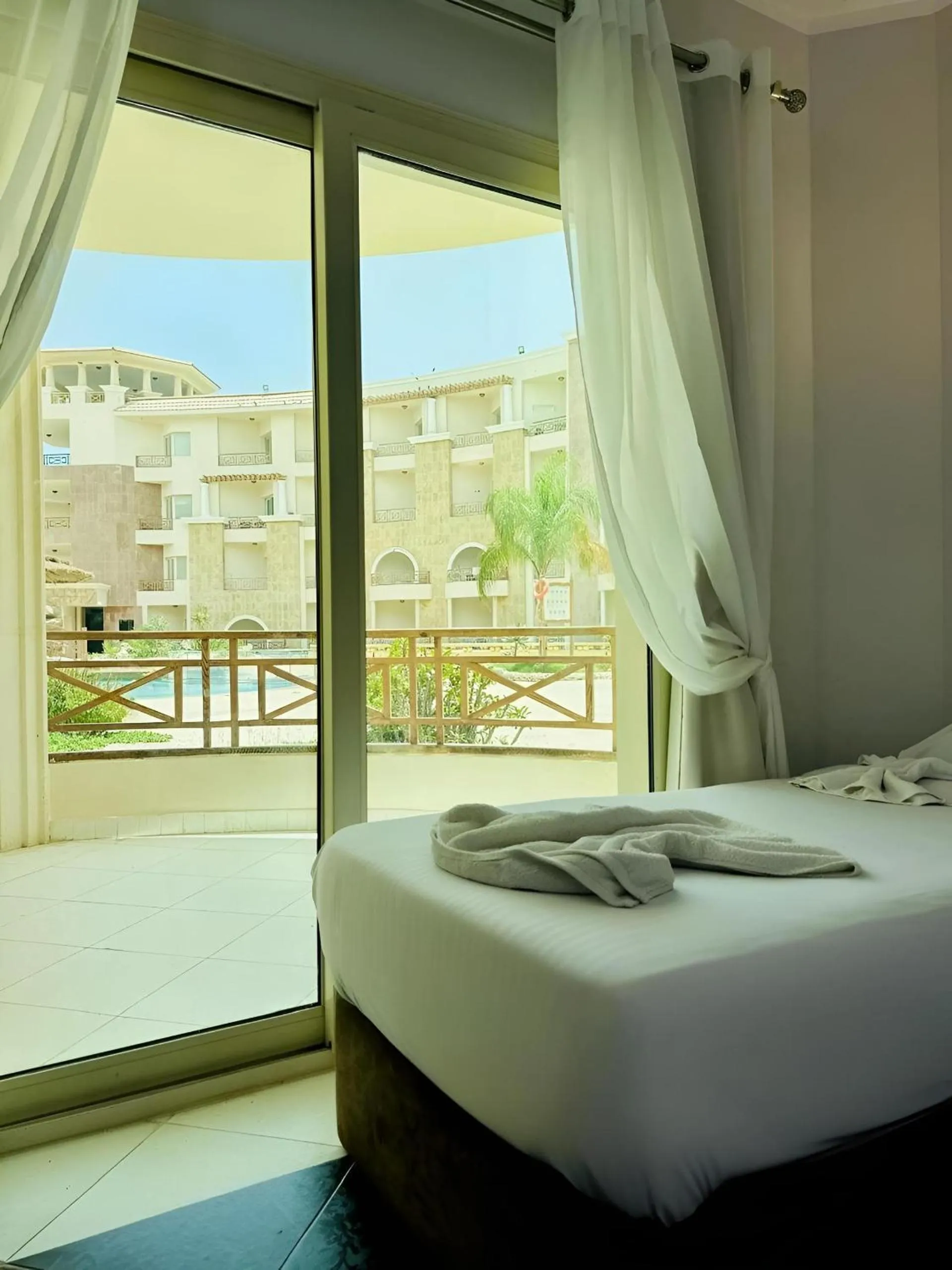 Bed in Royal Beach Serviced Apartments