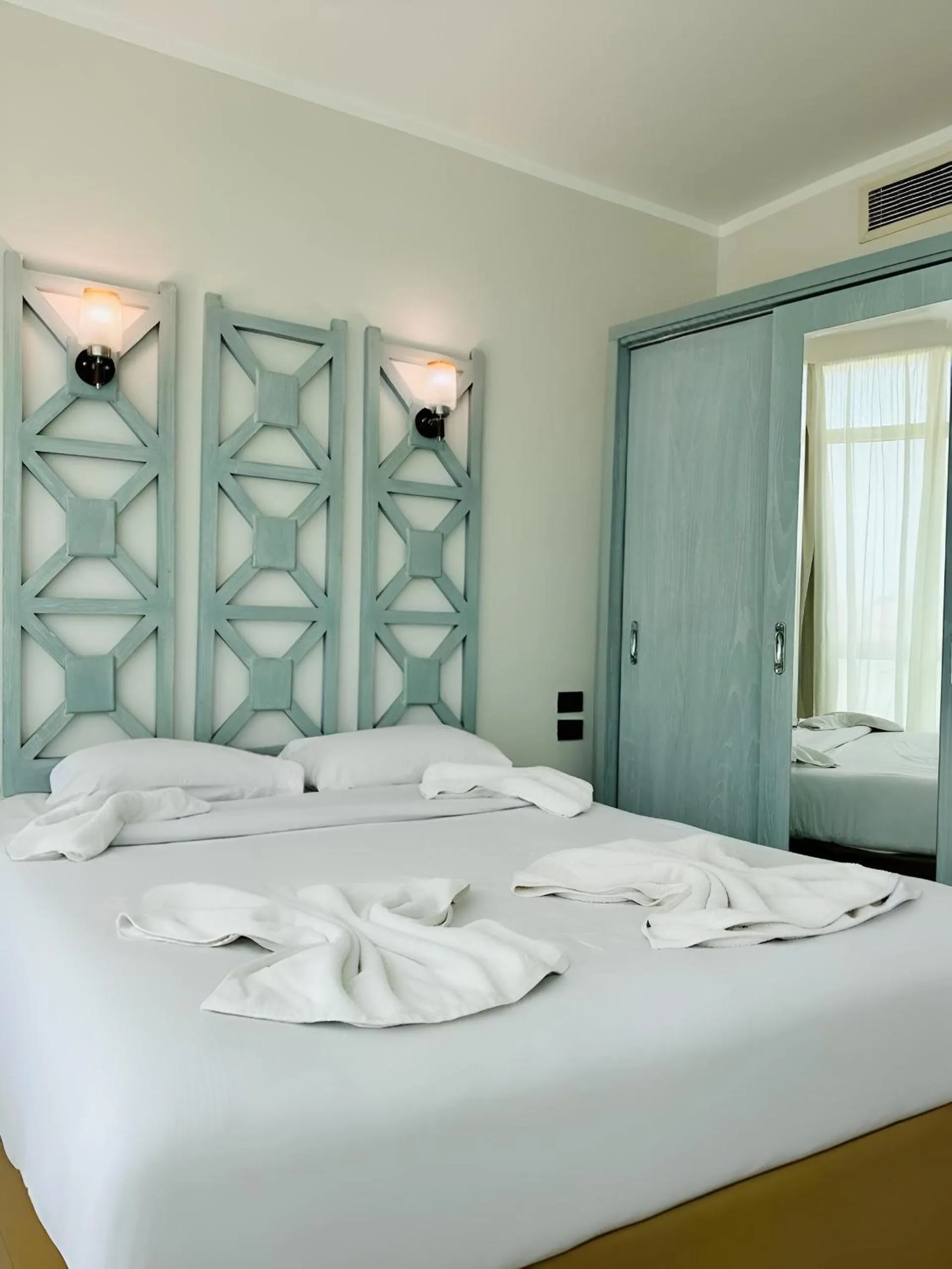 Bed in Royal Beach Serviced Apartments