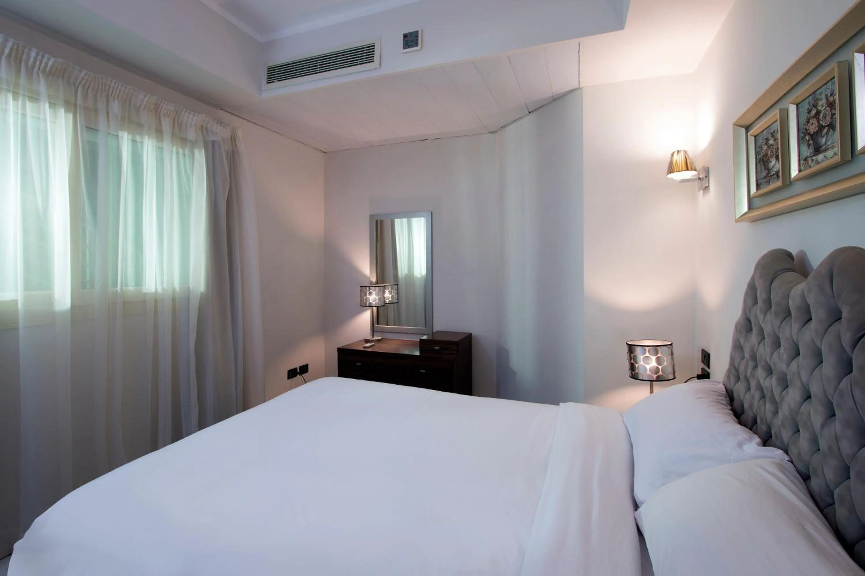 Bed in Royal Beach Serviced Apartments